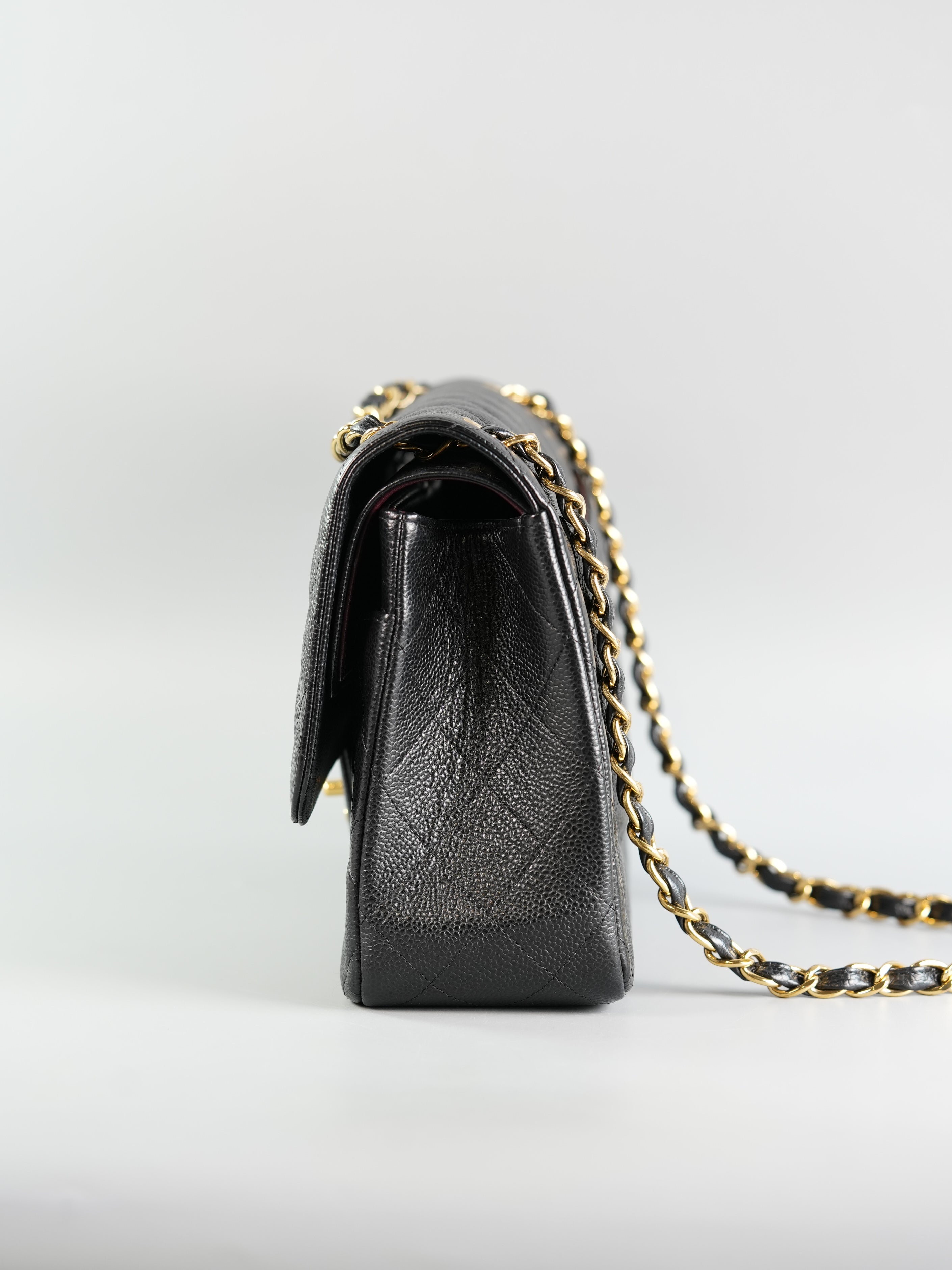 Classic Double Flap Jumbo Black Caviar Leather and Gold Hardware Series 23 | Purse Maison Luxury Bags Shop