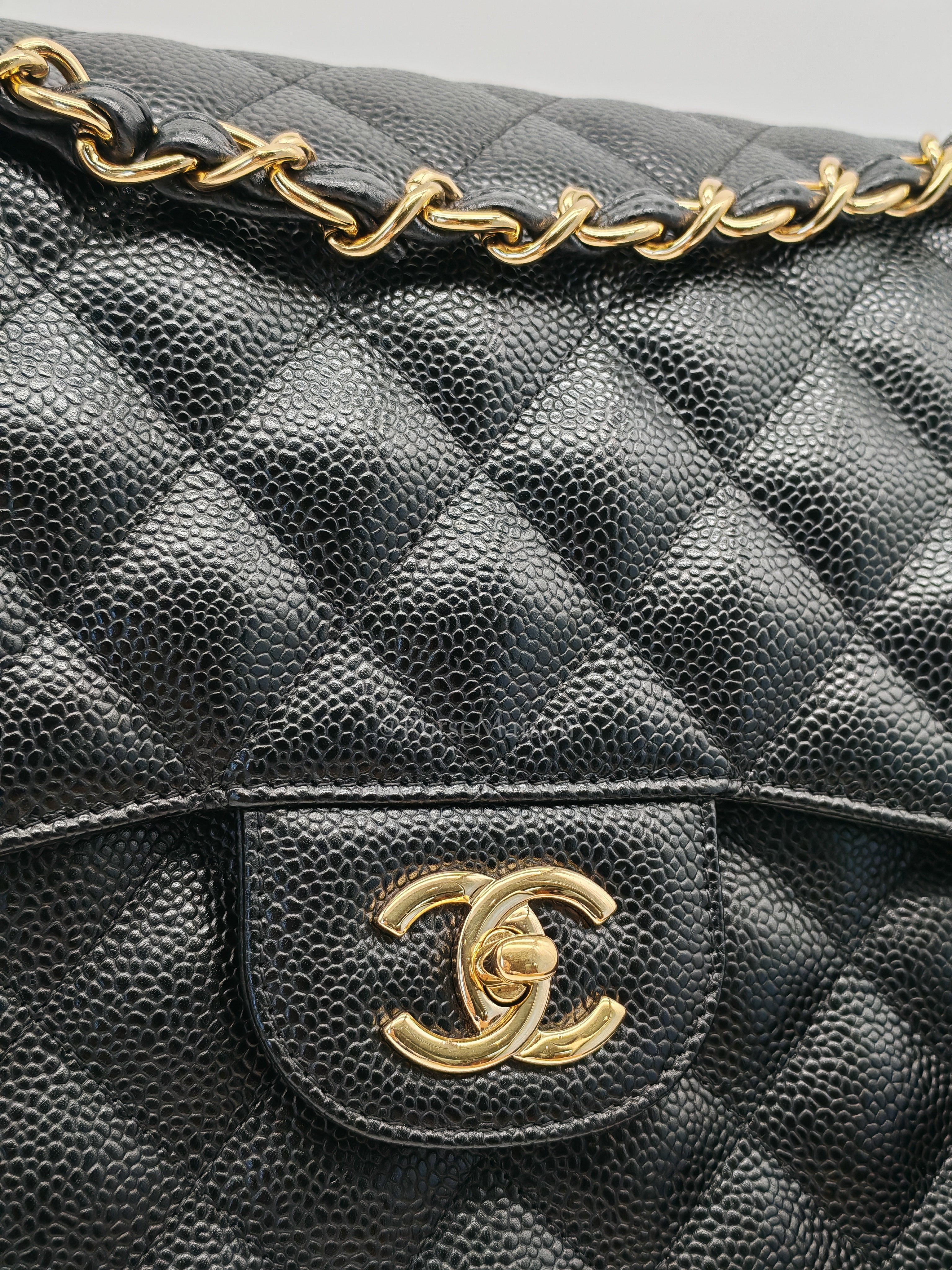 Classic Double Flap Jumbo Black Caviar Leather in Gold Hardware (Series 24) | Purse Maison Luxury Bags Shop