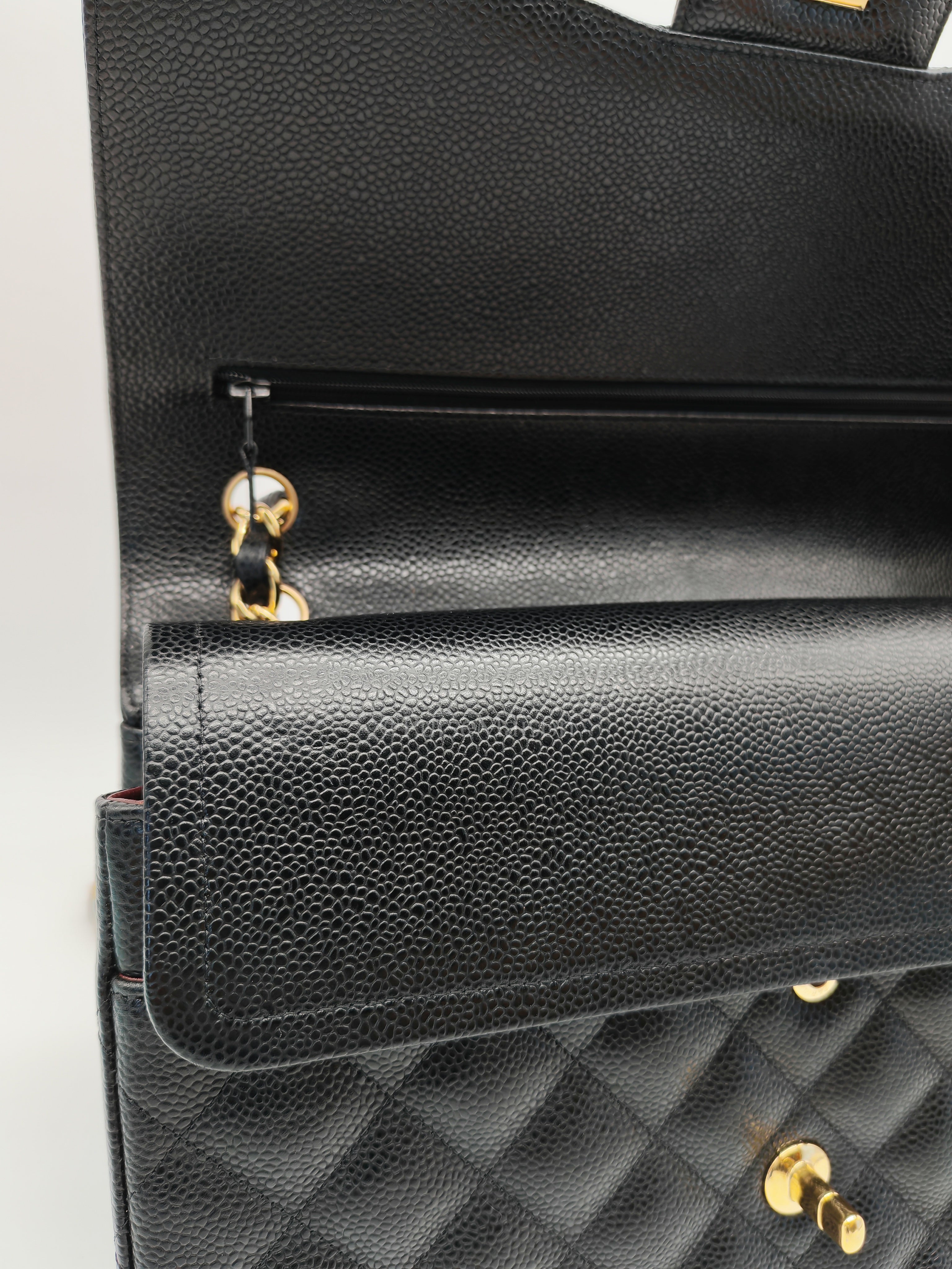 Classic Double Flap Jumbo Black Caviar Leather in Gold Hardware (Series 24) | Purse Maison Luxury Bags Shop