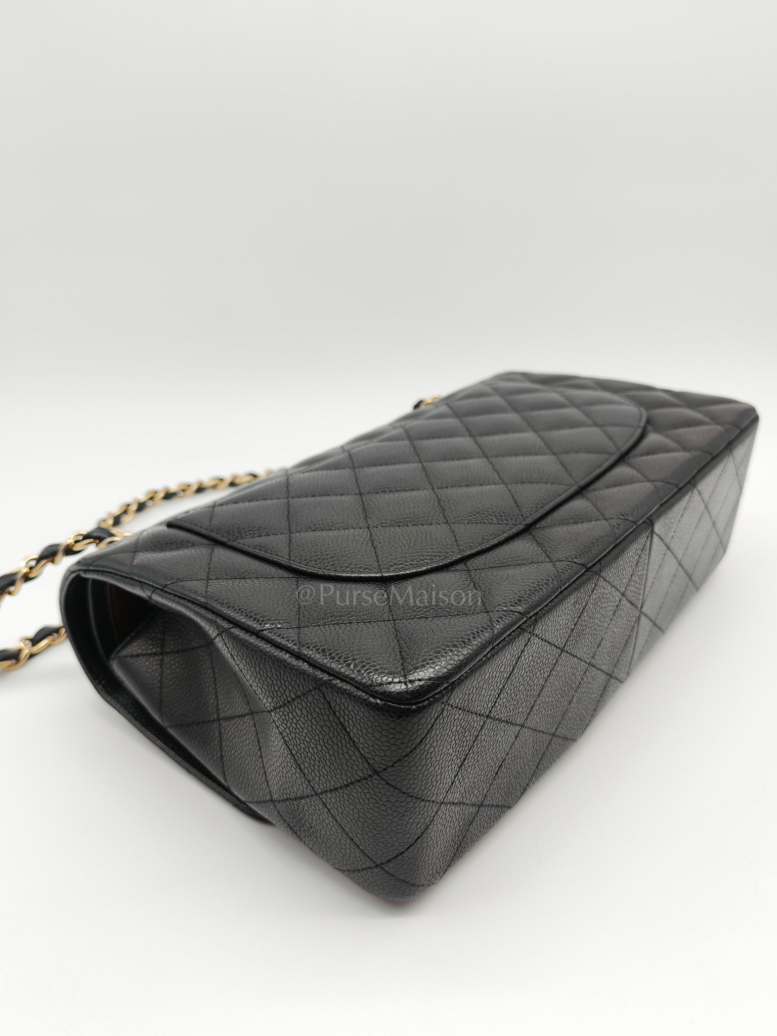 Classic Double Flap Jumbo in Black Caviar Leather and Gold Hardware Series 14 | Purse Maison Luxury Bags Shop