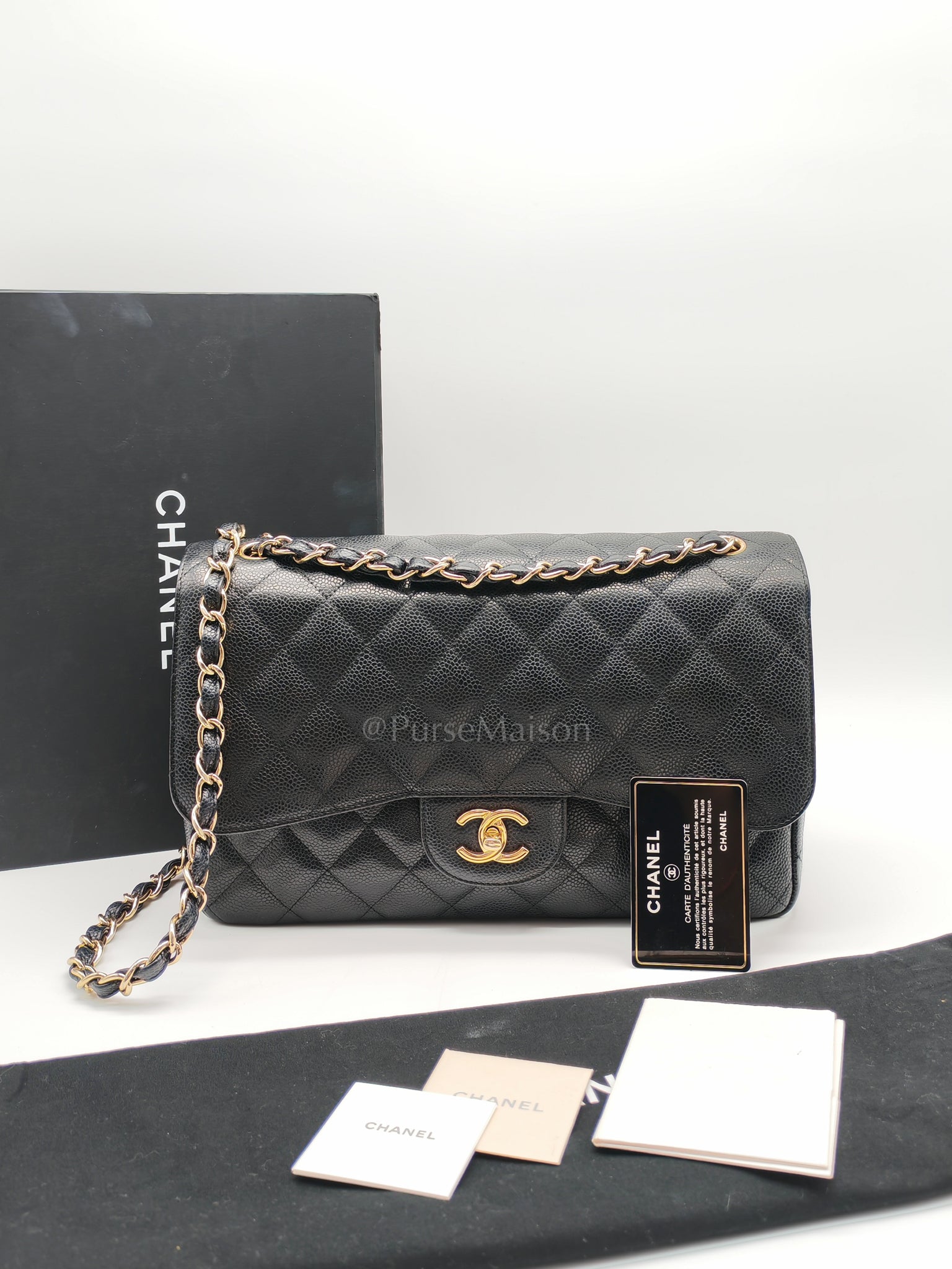 Classic Double Flap Jumbo in Black Caviar Leather and Gold Hardware Series 14 | Purse Maison Luxury Bags Shop