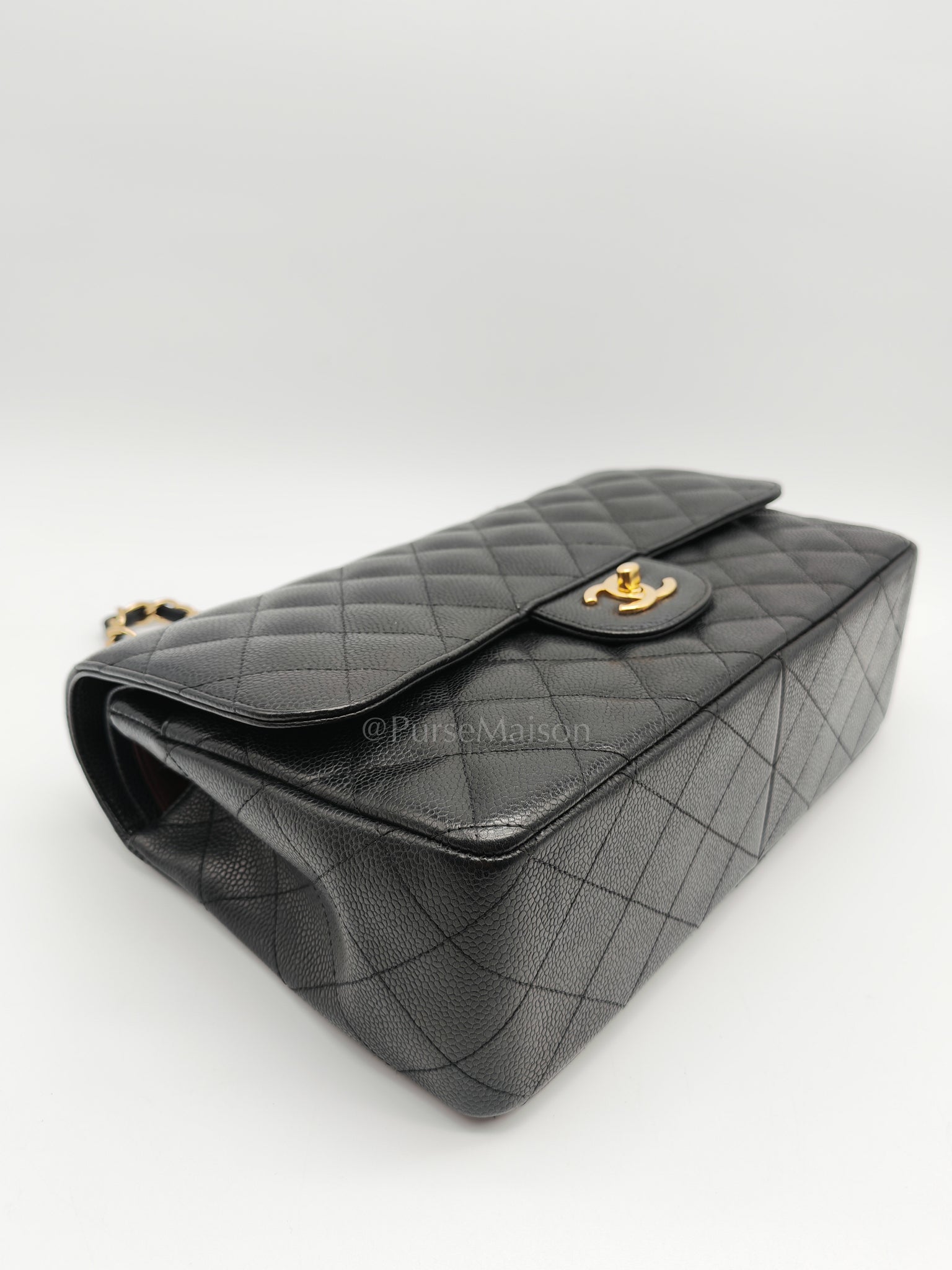 Classic Double Flap Jumbo in Black Caviar Leather and Gold Hardware Series 14 | Purse Maison Luxury Bags Shop