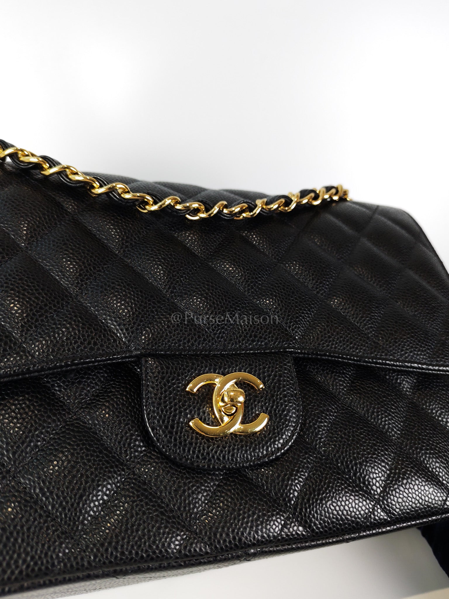 Classic Double Flap Jumbo in Black Caviar Leather and Gold Hardware Series 22 | Purse Maison Luxury Bags Shop