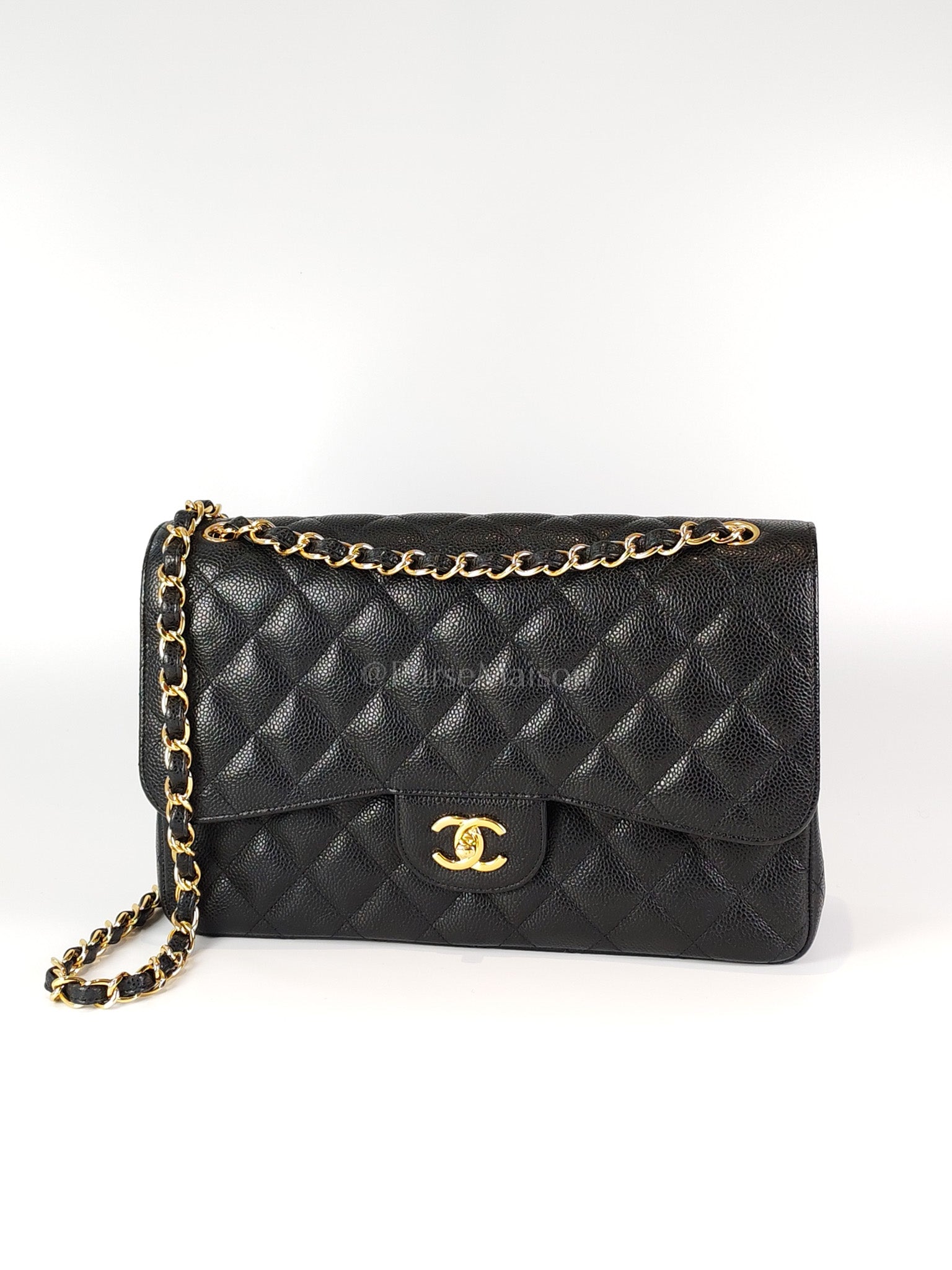Classic Double Flap Jumbo in Black Caviar Leather and Gold Hardware Series 22 | Purse Maison Luxury Bags Shop