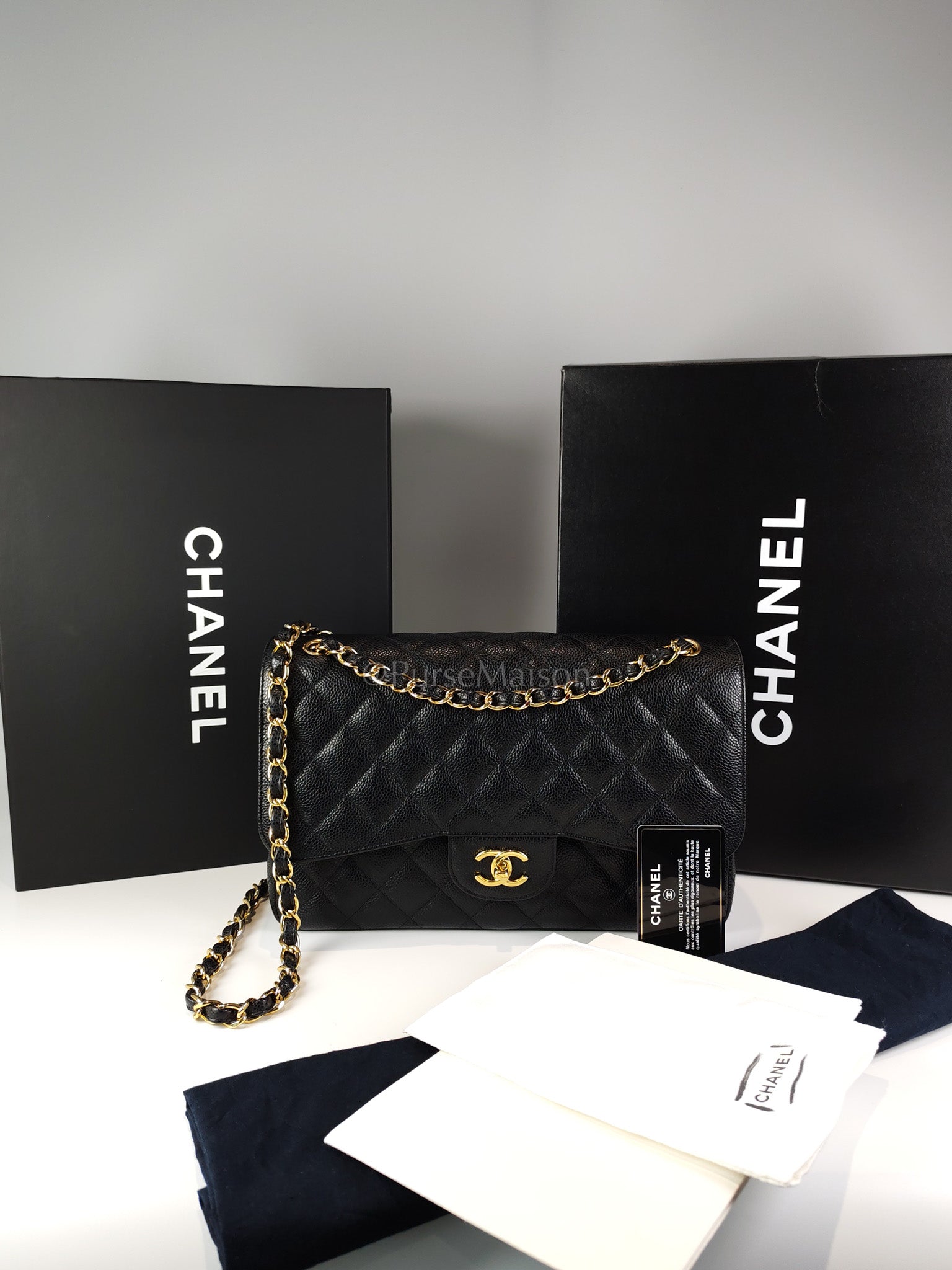 Classic Double Flap Jumbo in Black Caviar Leather and Gold Hardware Series 22 | Purse Maison Luxury Bags Shop