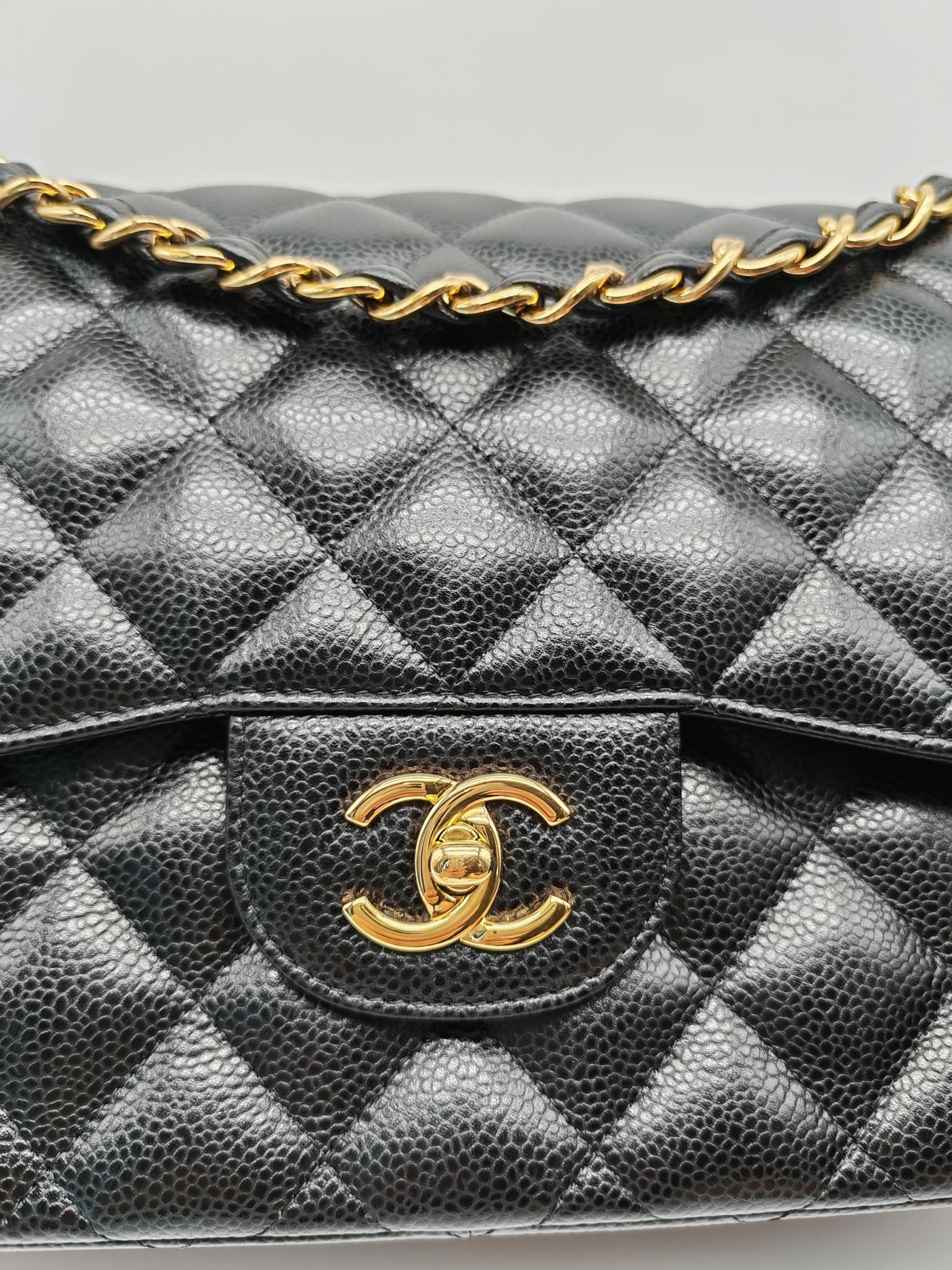 Classic Double Flap Jumbo in Black Caviar Leather and Gold Hardware Series 25 | Purse Maison Luxury Bags Shop