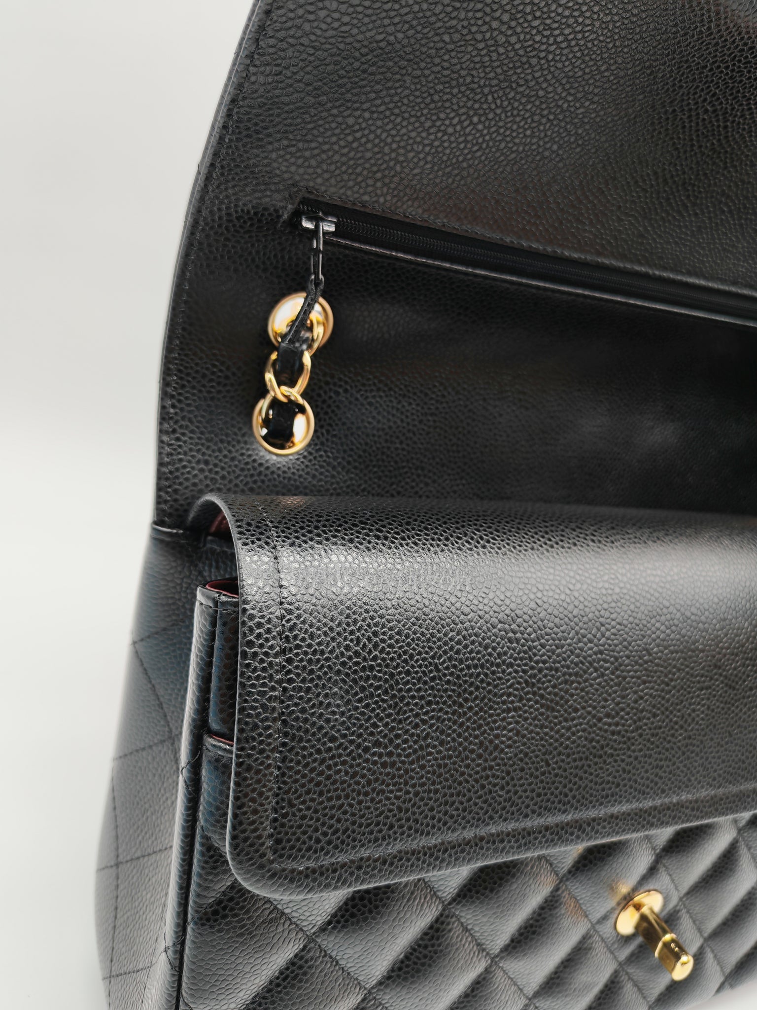 Classic Double Flap Jumbo in Black Caviar Leather and Gold Hardware Series 25 | Purse Maison Luxury Bags Shop