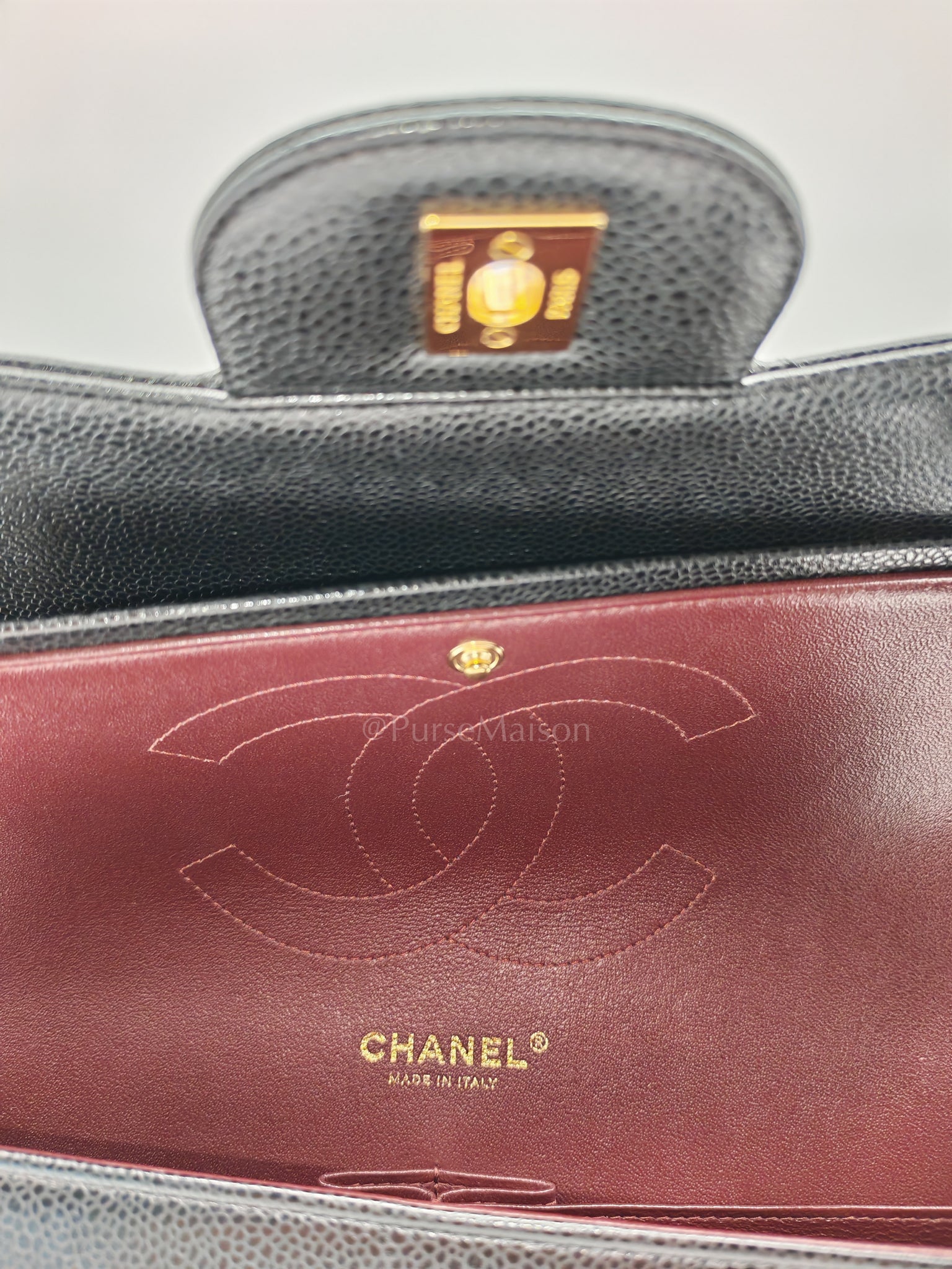 Classic Double Flap Jumbo in Black Caviar Leather and Gold Hardware Series 25 | Purse Maison Luxury Bags Shop