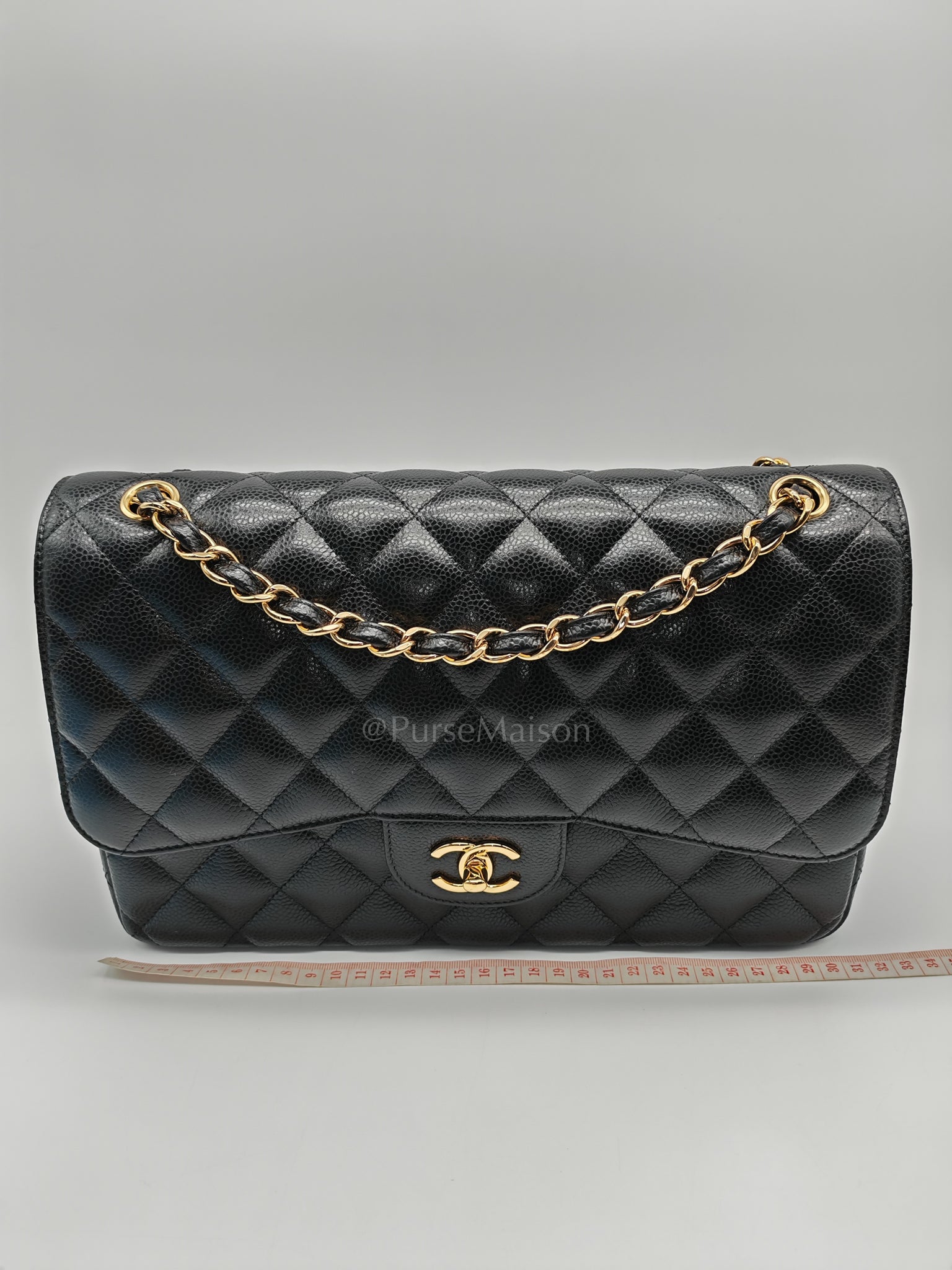 Classic Double Flap Jumbo in Black Caviar Leather and Gold Hardware Series 25 | Purse Maison Luxury Bags Shop