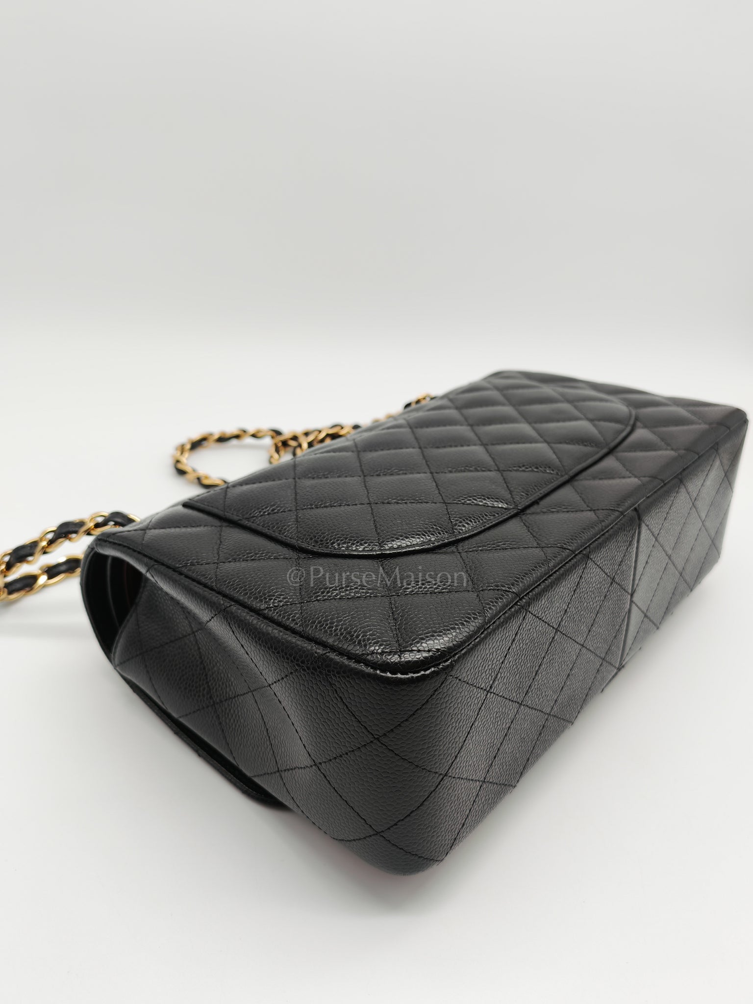 Classic Double Flap Jumbo in Black Caviar Leather and Gold Hardware Series 26 | Purse Maison Luxury Bags Shop
