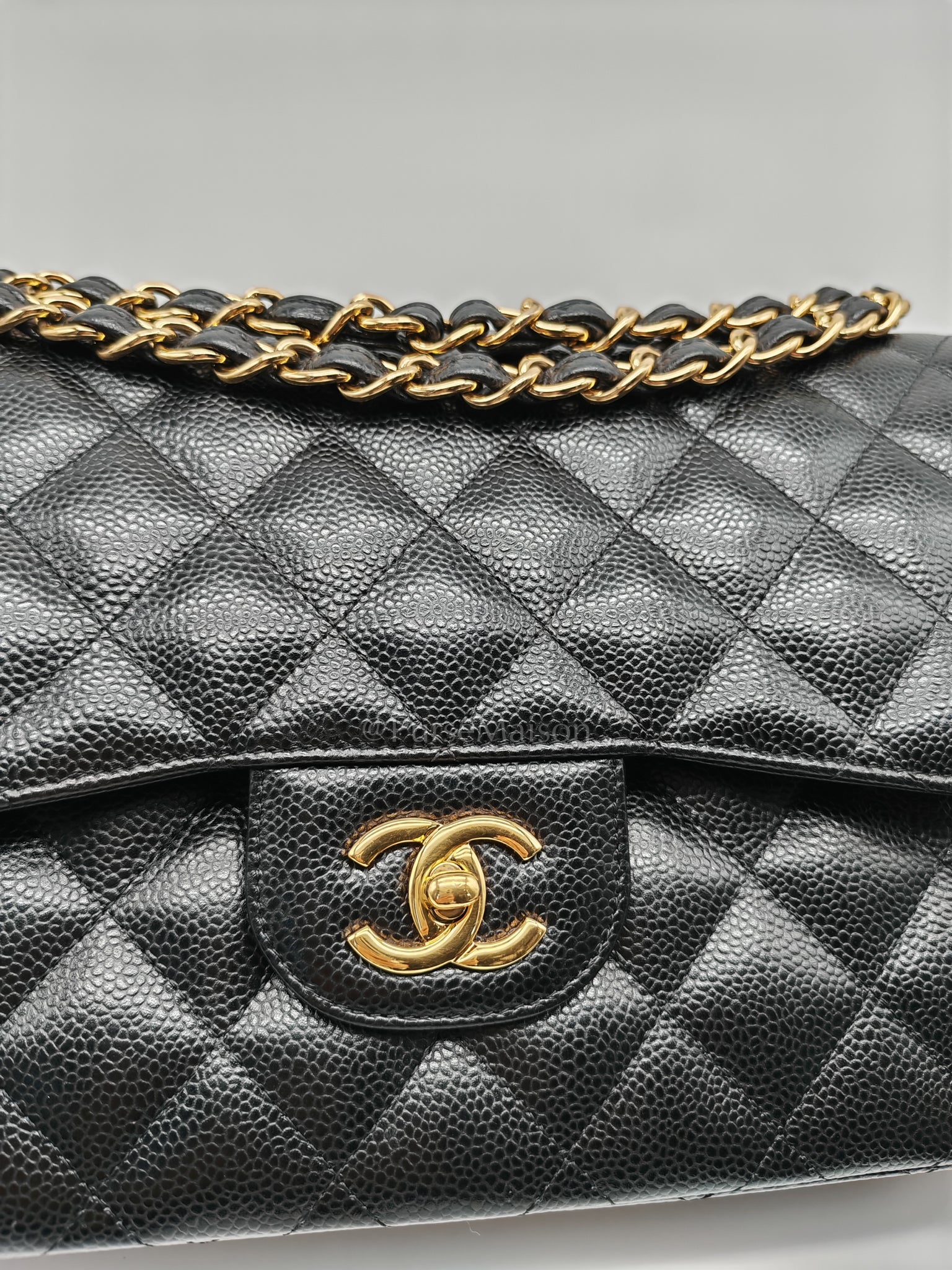 Classic Double Flap Jumbo in Black Caviar Leather and Gold Hardware Series 26 | Purse Maison Luxury Bags Shop