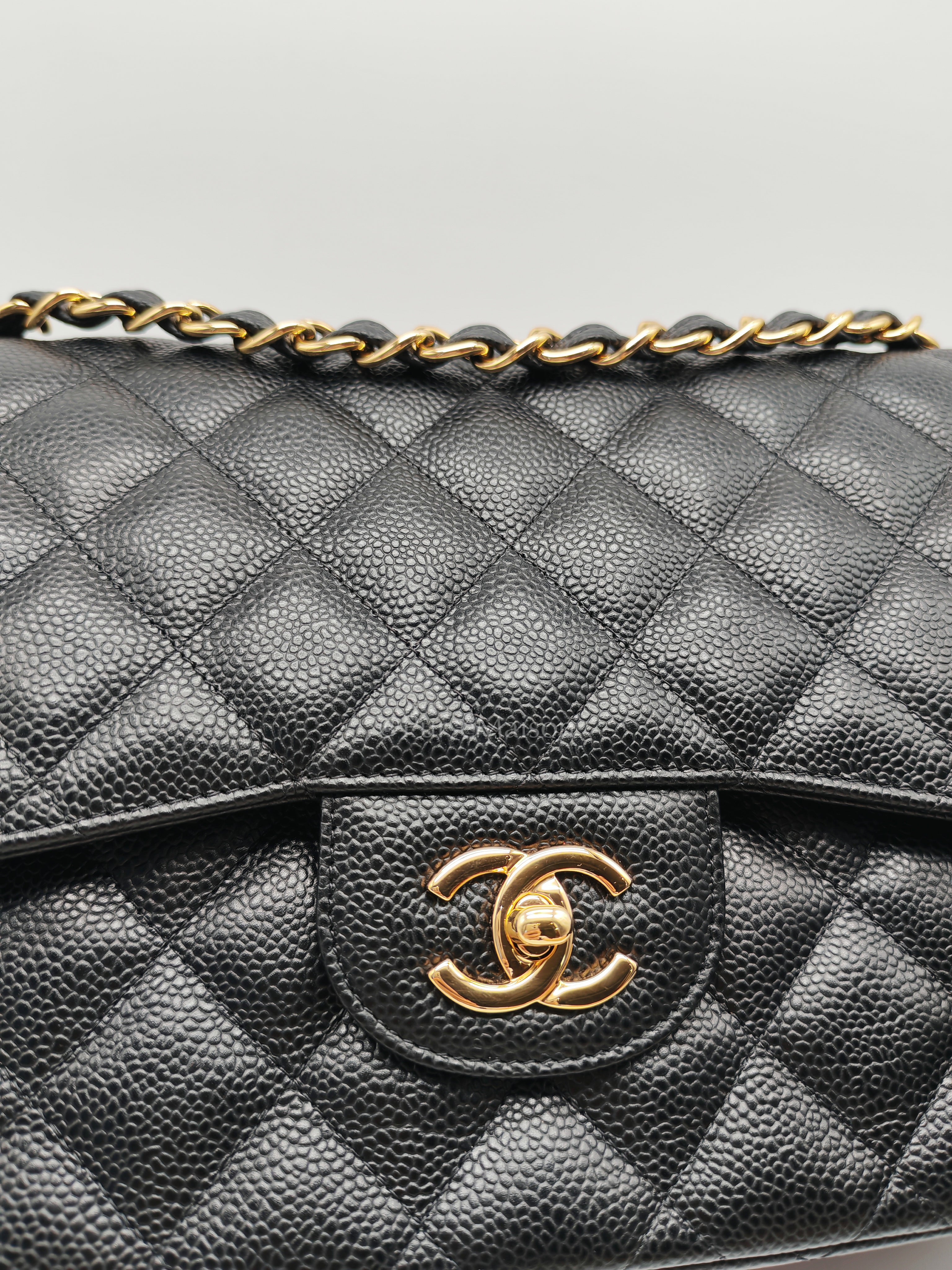 Classic Double Flap Jumbo in Black Caviar Leather and Gold Hardware Series 27 | Purse Maison Luxury Bags Shop