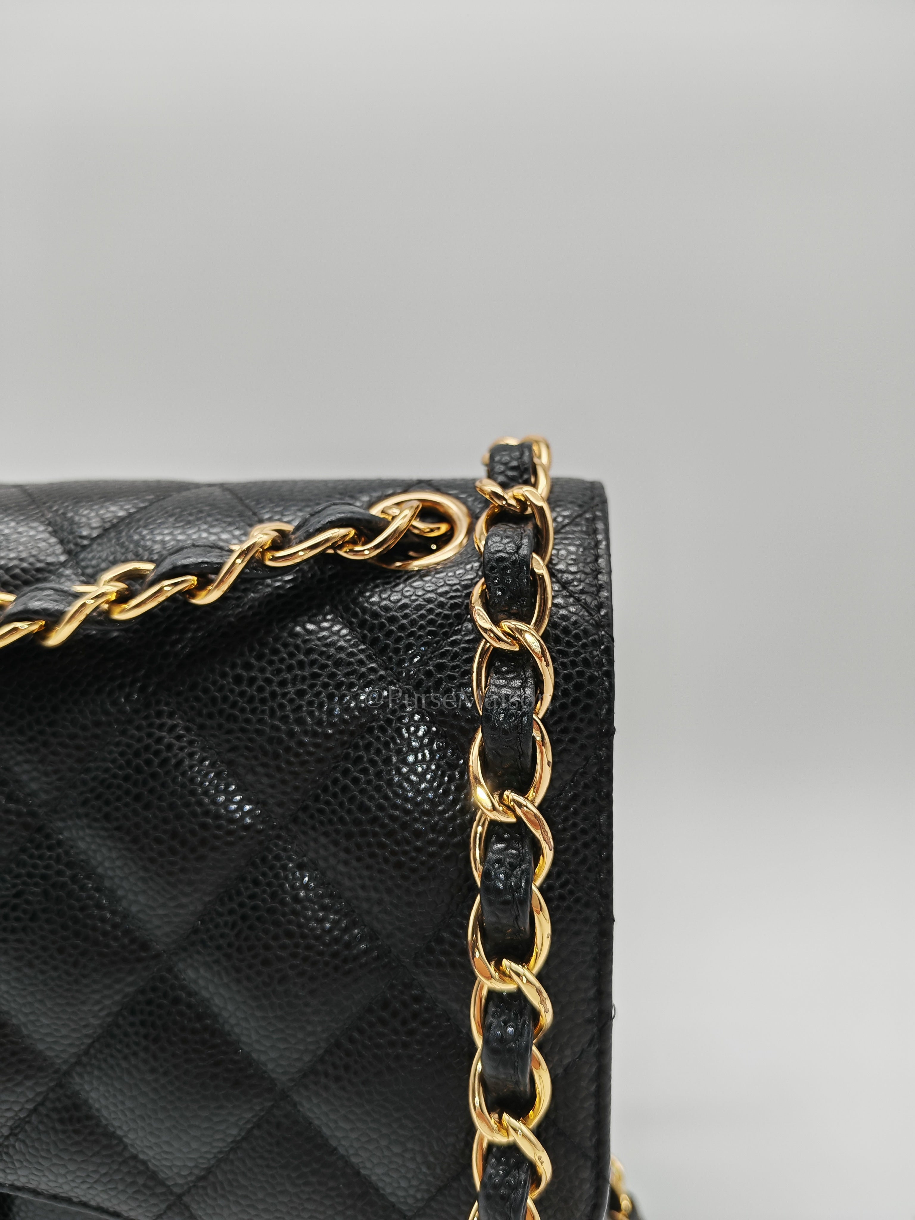 Classic Double Flap Jumbo in Black Caviar Leather & Gold Hardware Series 22 | Purse Maison Luxury Bags Shop