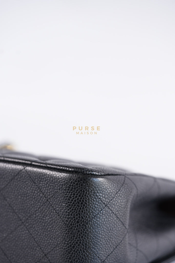 Classic Double Flap Jumbo in Black Caviar Leather in Gold Hardware (Series 19) | Purse Maison Luxury Bags Shop