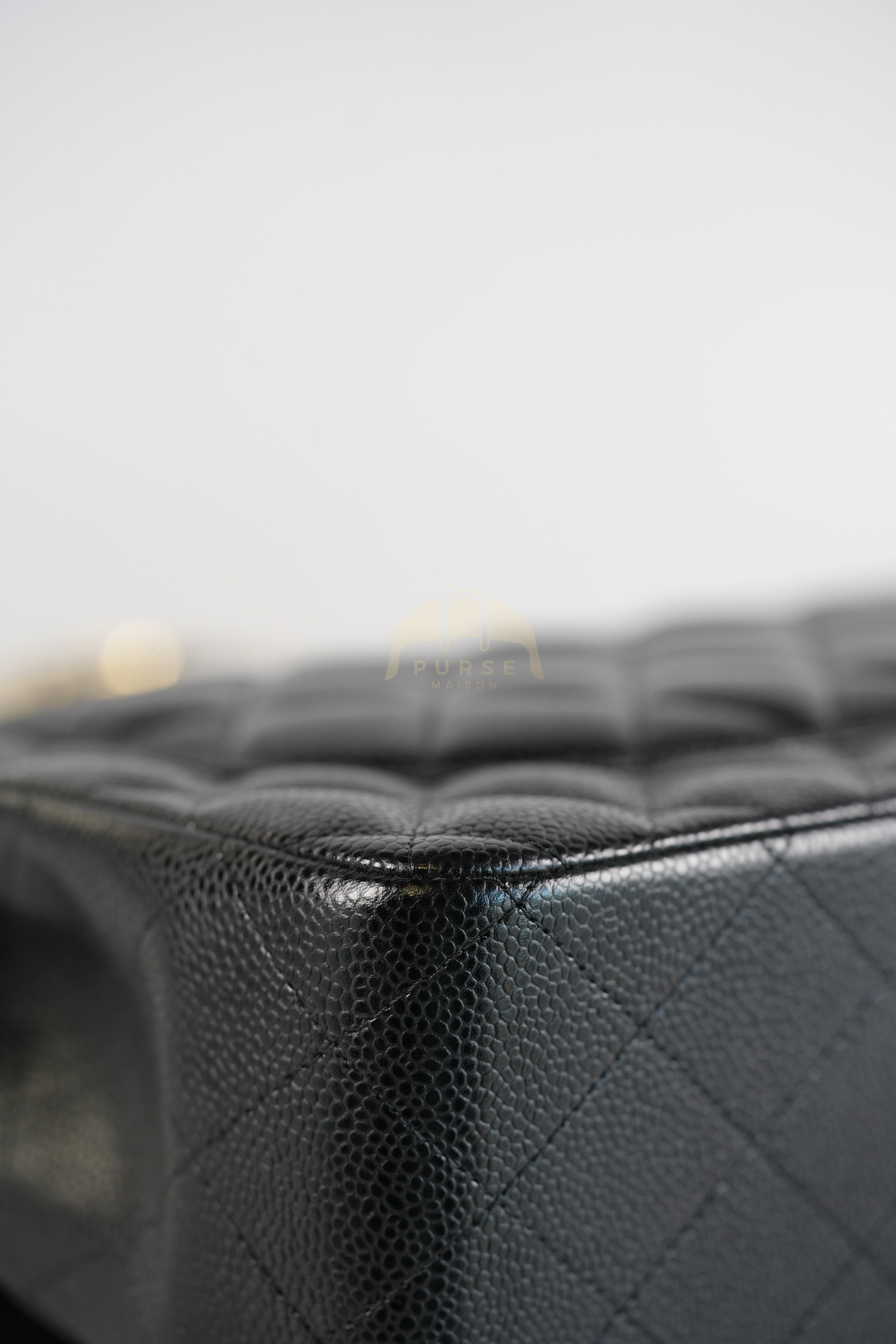 Classic Double Flap Jumbo in Black Quilted Caviar Leather and Gold Hardware Series 26 | Purse Maison Luxury Bags Shop