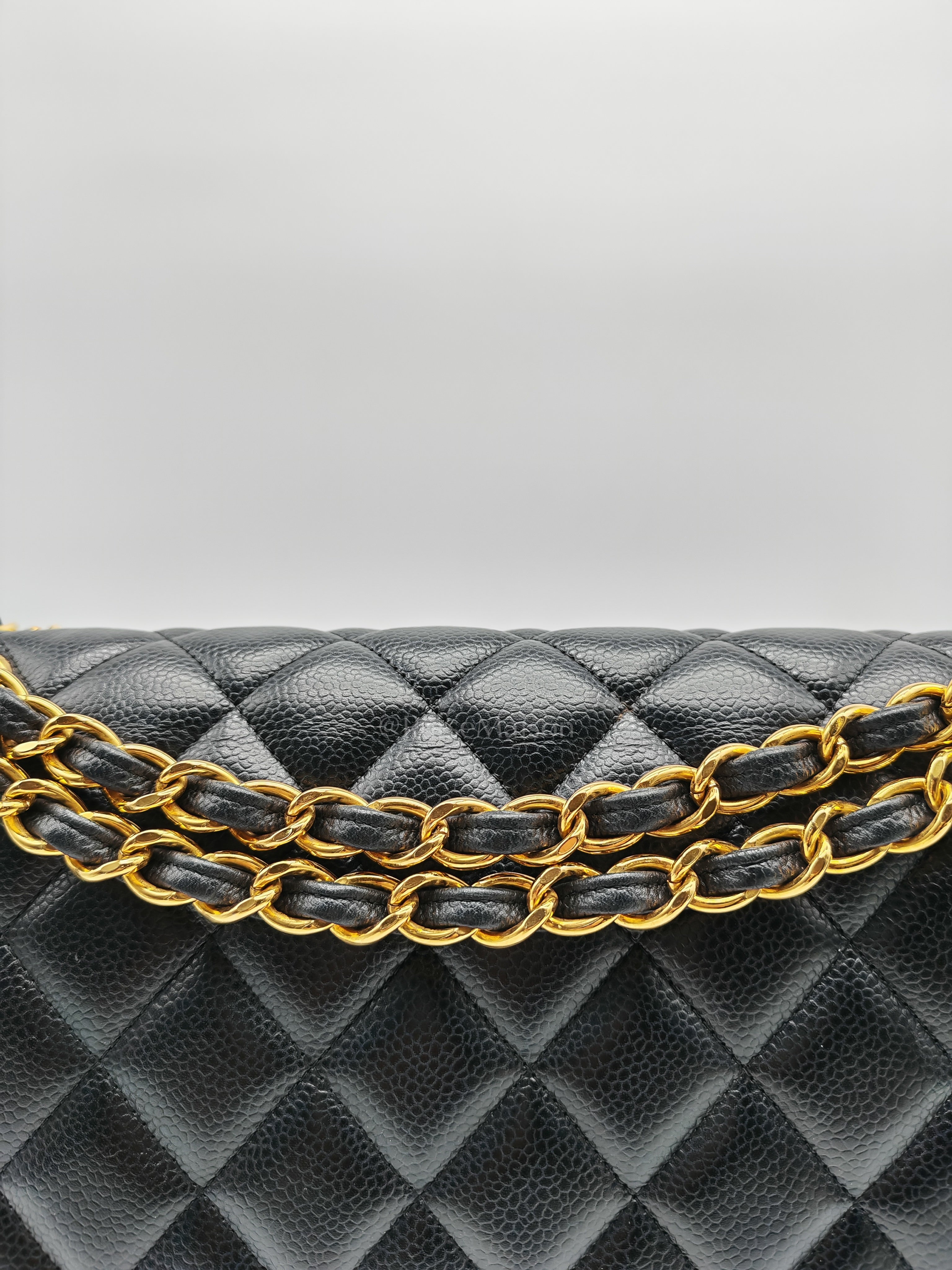 Classic Double Flap Jumbo in Black Quilted Caviar Leather & Gold Hardware Series 16 | Purse Maison Luxury Bags Shop