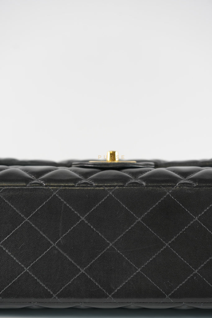 Classic Double Flap Maxi in Black Lambskin Leather and Gold Hardware Series 14 | Purse Maison Luxury Bags Shop