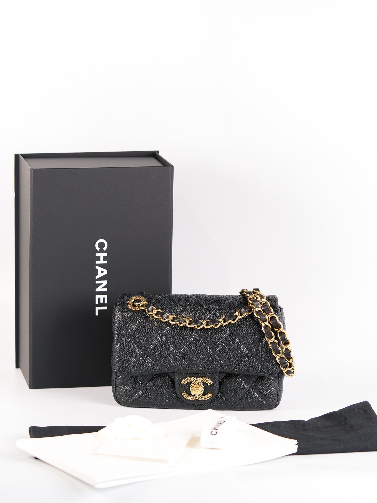 Classic Mini Flap in Black Quilted Caviar Leather and Gold Hardware (Microchip) | Purse Maison Luxury Bags Shop