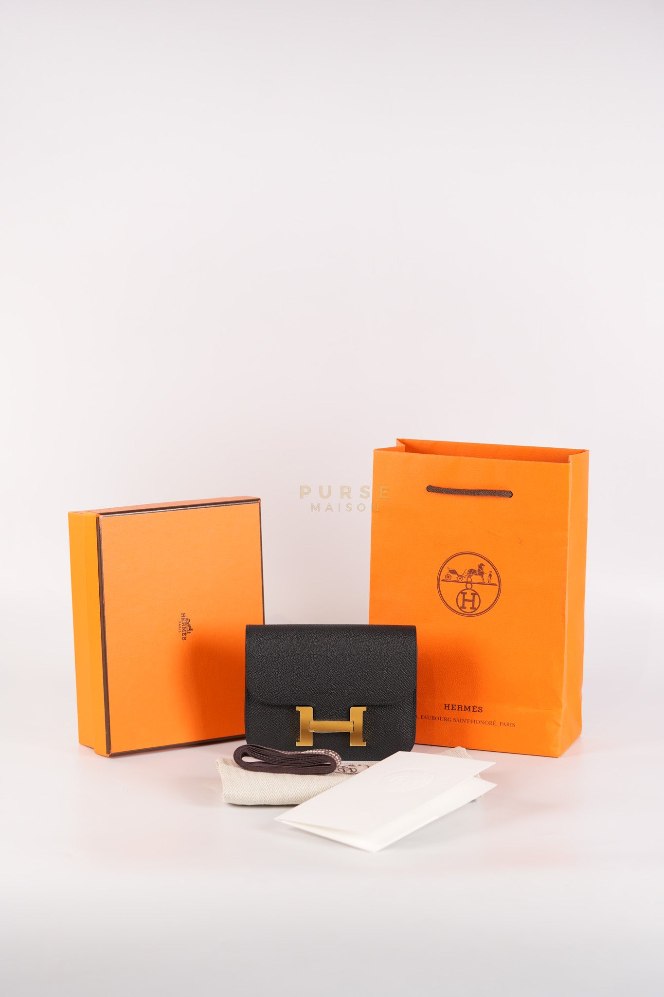 Constance Slim in Black Epsom Leather and Gold Hardware Stamp W (2024) | Purse Maison Luxury Bags Shop