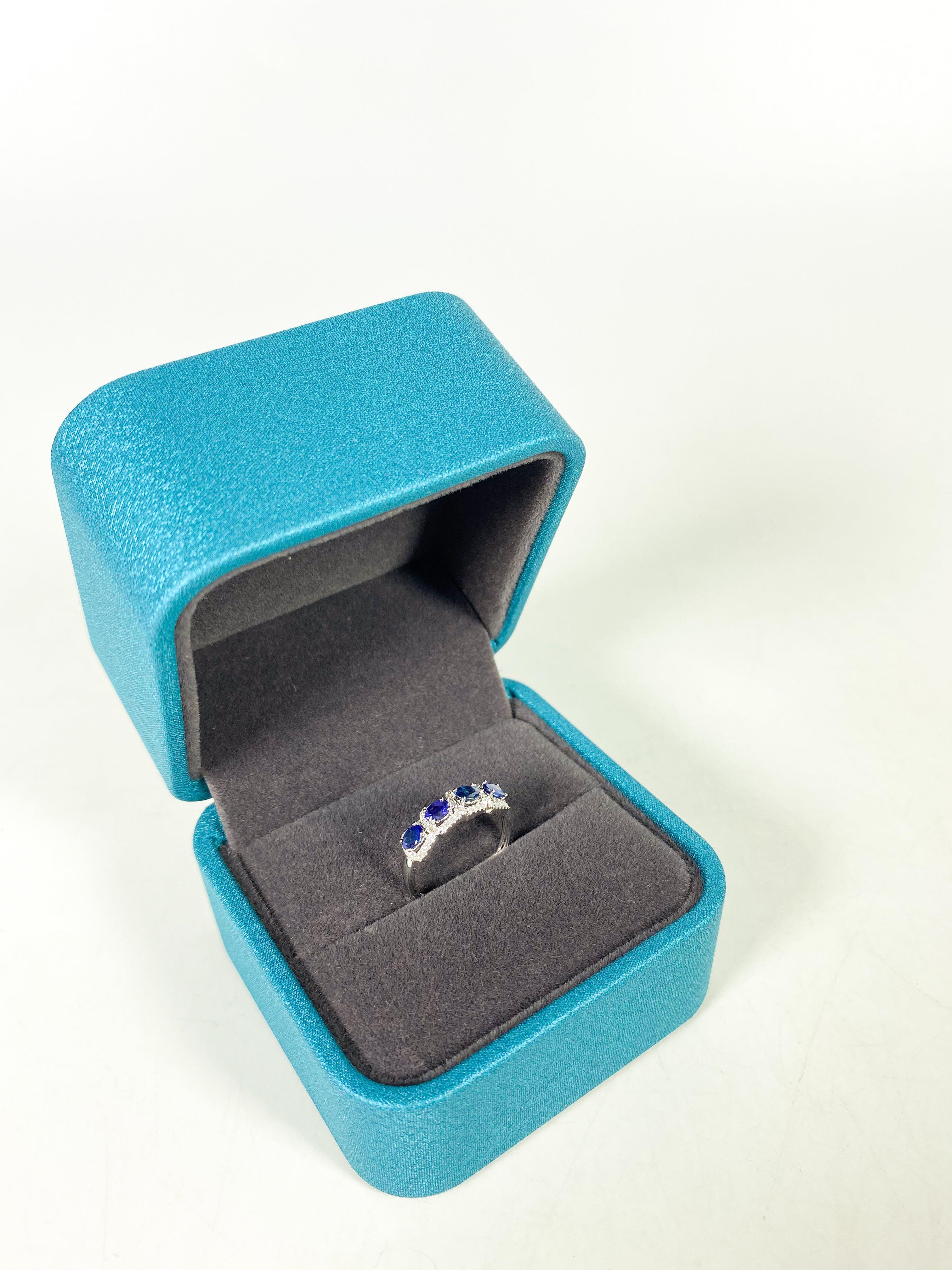 Diamond Ring in 18k White Gold and Blue Sapphire (size 6)