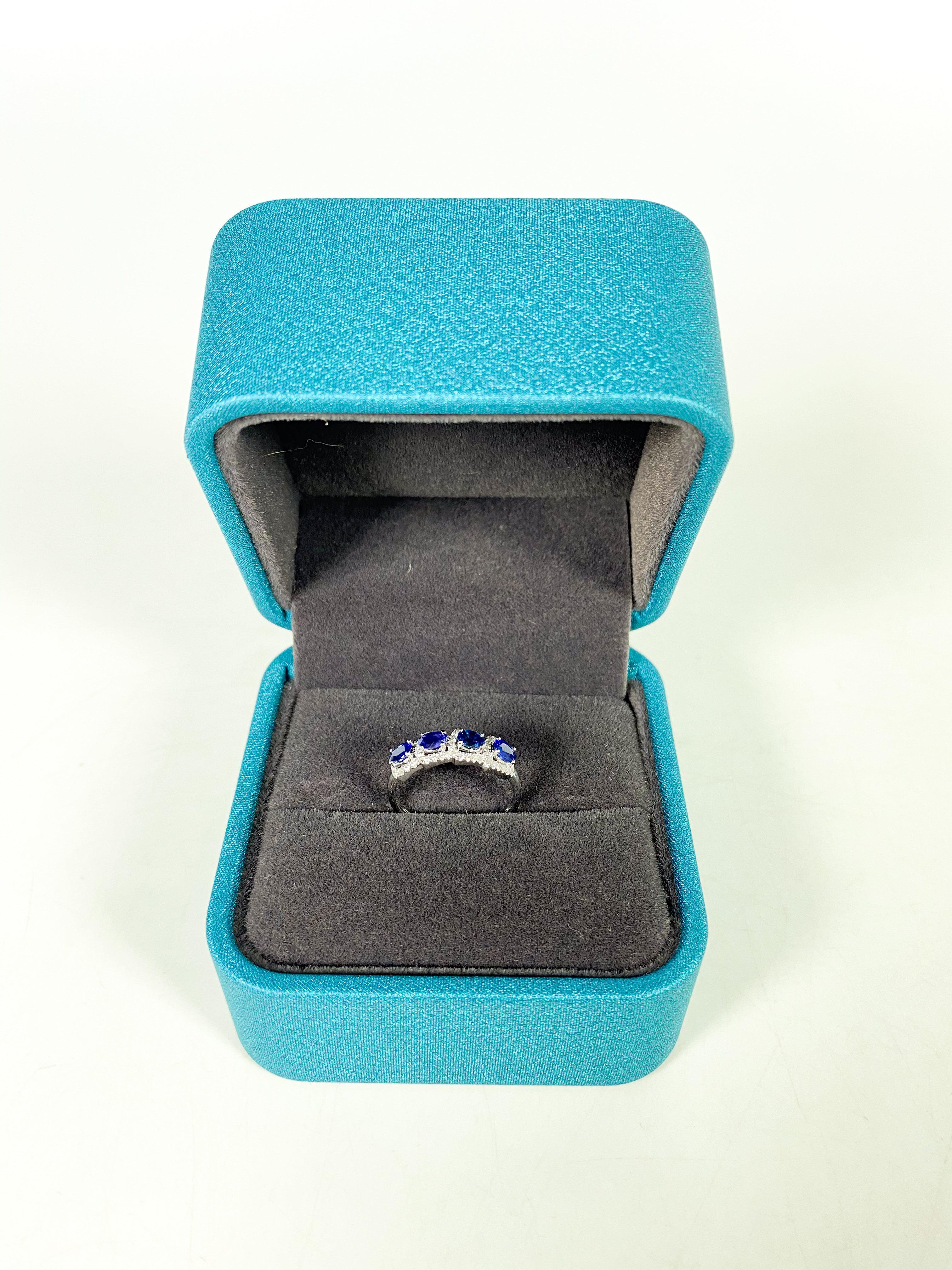 Diamond Ring in 18k White Gold and Blue Sapphire (size 6)