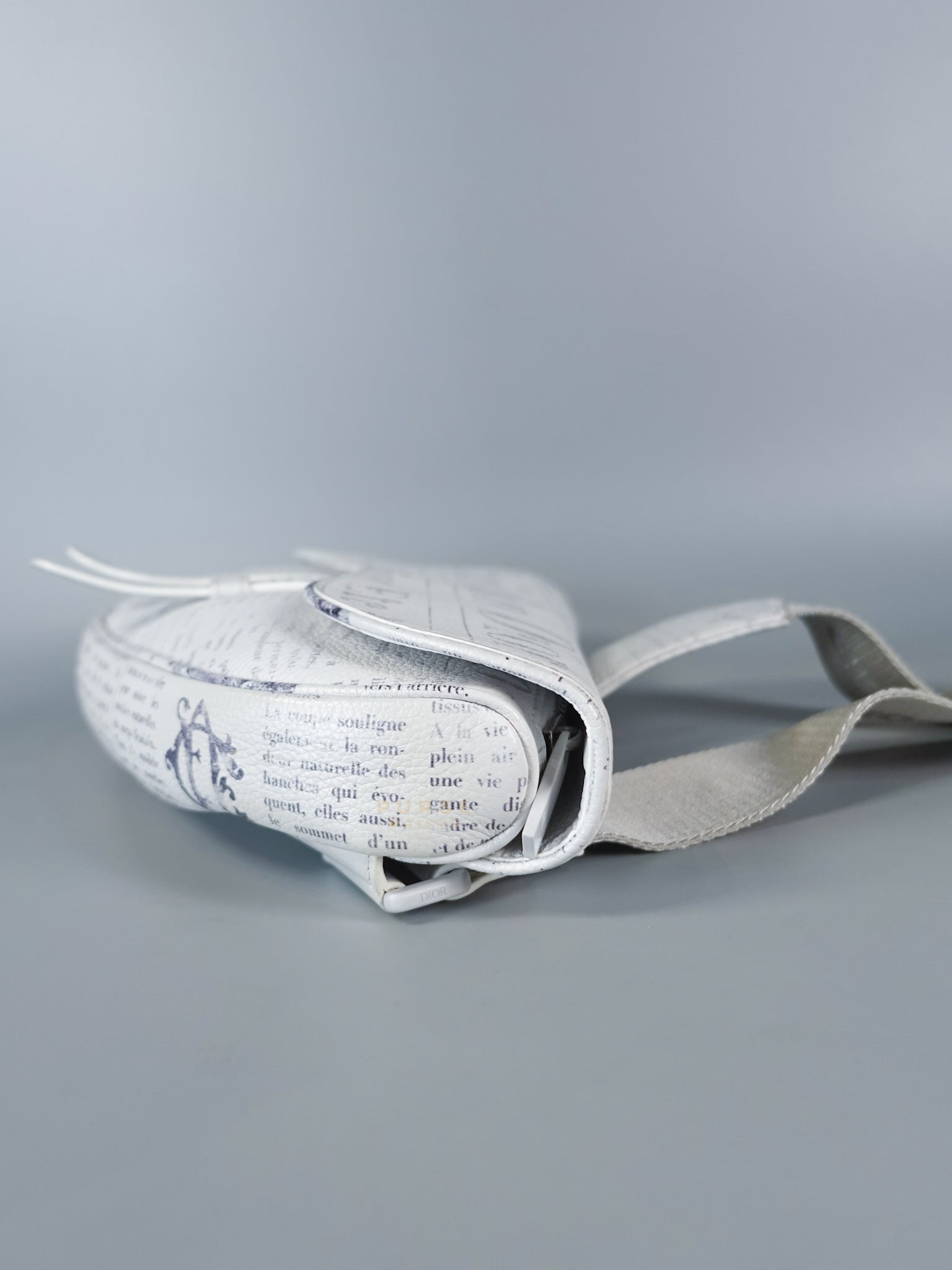 Dior X Daniel Arsham Grained Calfskin White Newspaper Print Saddle Bag | Purse Maison Luxury Bags Shop