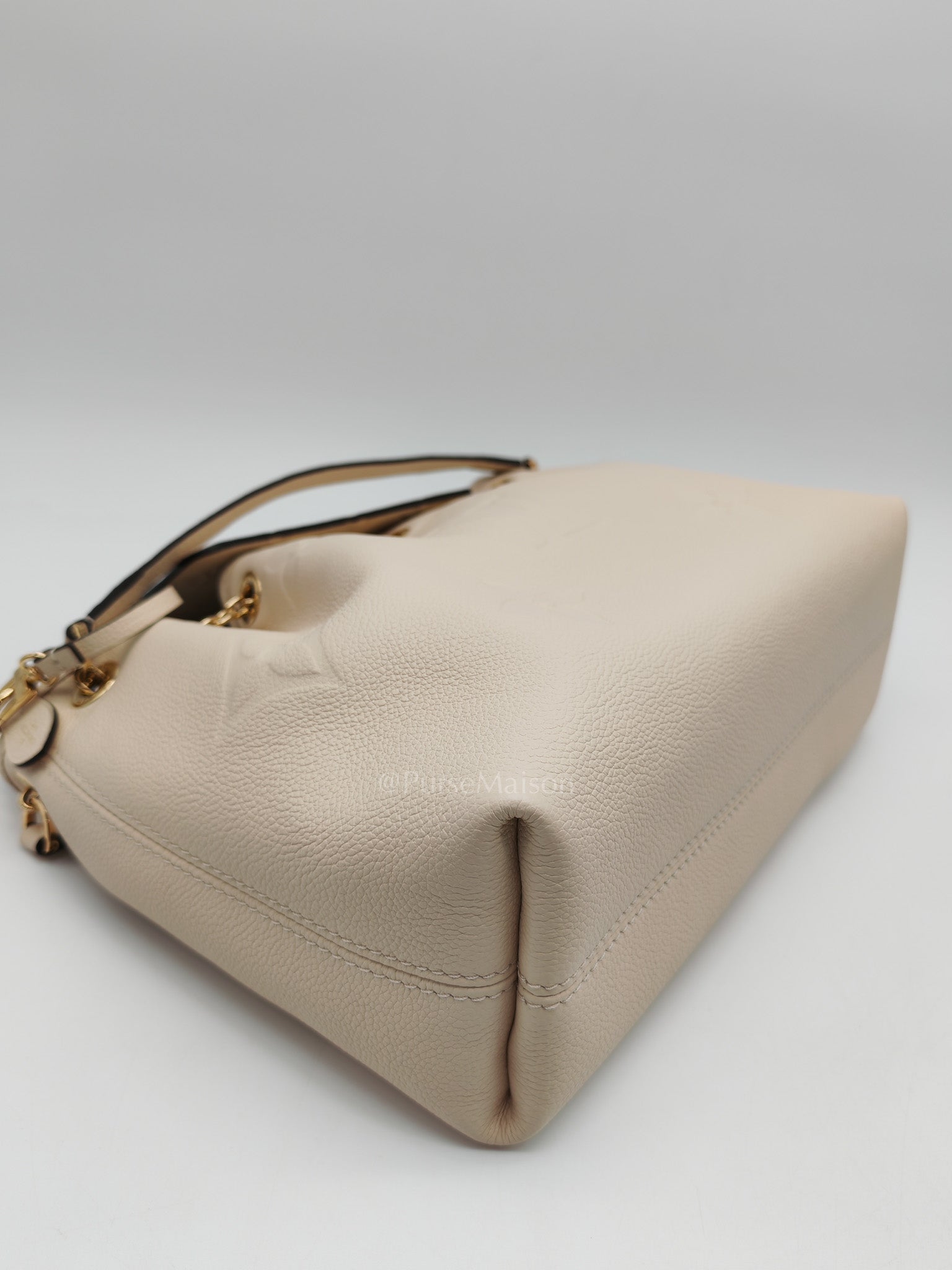 Louis Vuitton Bundle Bag in Cream Monogram Empreinte Giant and Gold Hardware Microchip