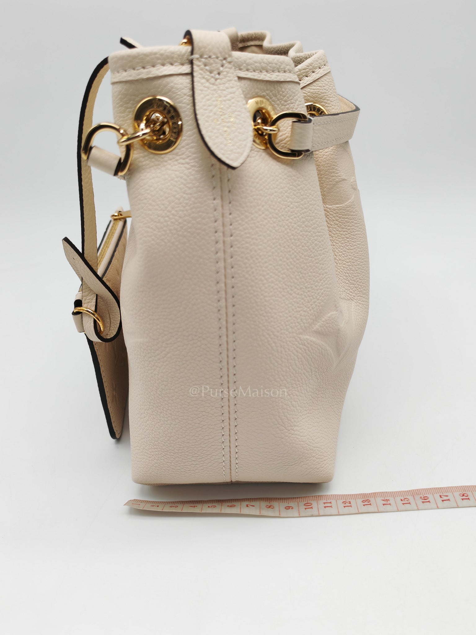 Louis Vuitton Bundle Bag in Cream Monogram Empreinte Giant and Gold Hardware Microchip