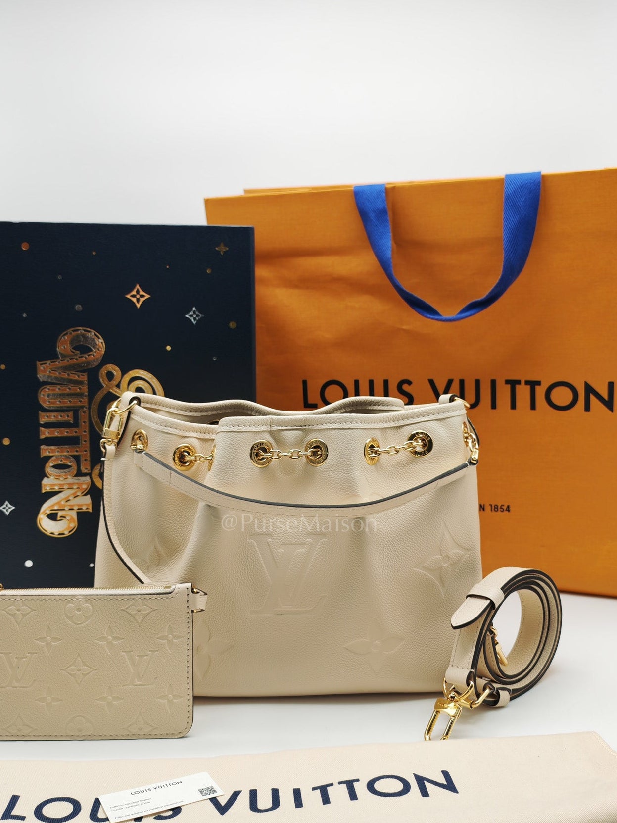 Louis Vuitton Bundle Bag in Cream Monogram Empreinte Giant and Gold Hardware Microchip