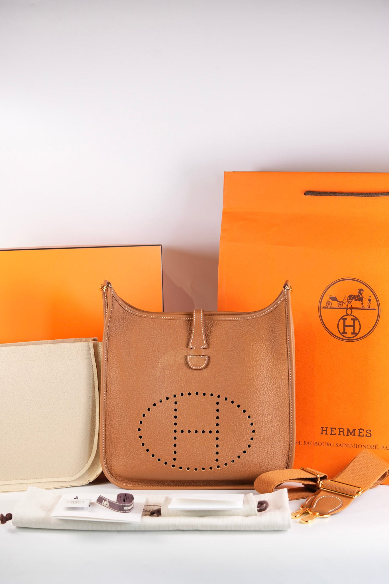 Evelyn PM in Gold Clemence Leather and Gold Hardware Stamp W (2024) | Purse Maison Luxury Bags Shop