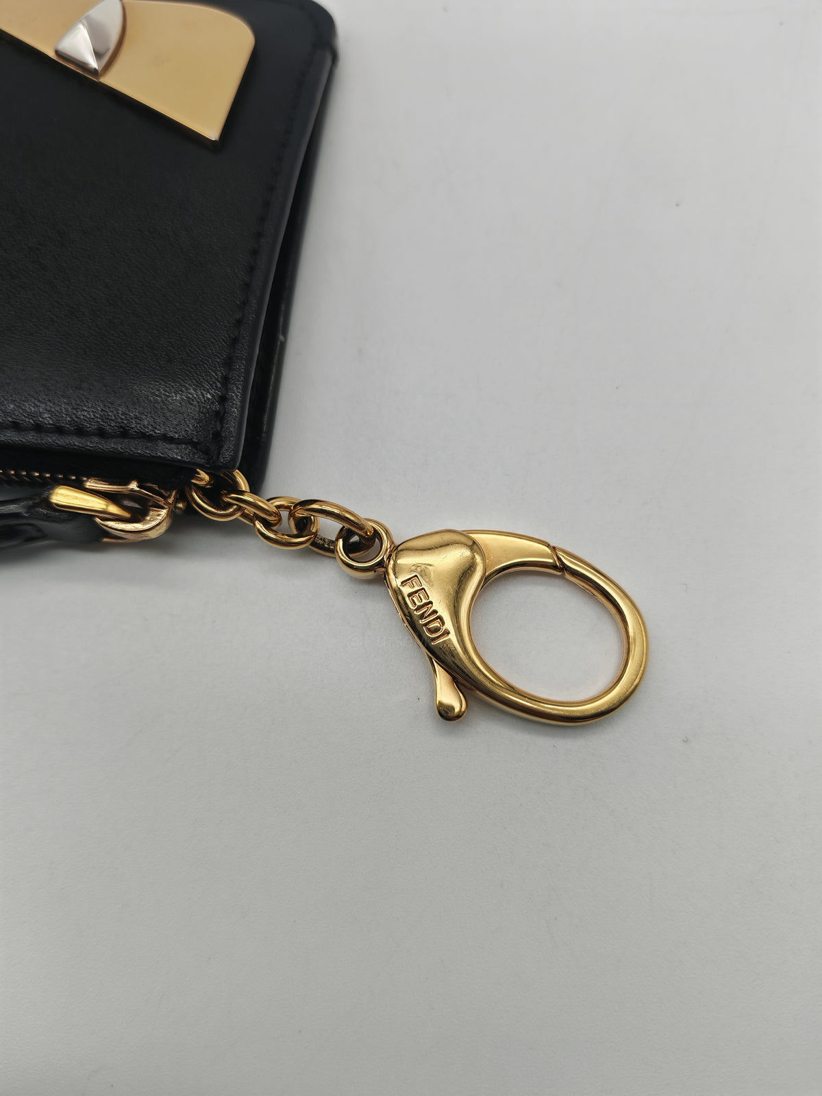 Fendi Bag Bugs Monster Eyes Key Coin Pouch in Black Calfskin Leather and Gold Hardware | Purse Maison Luxury Bags Shop