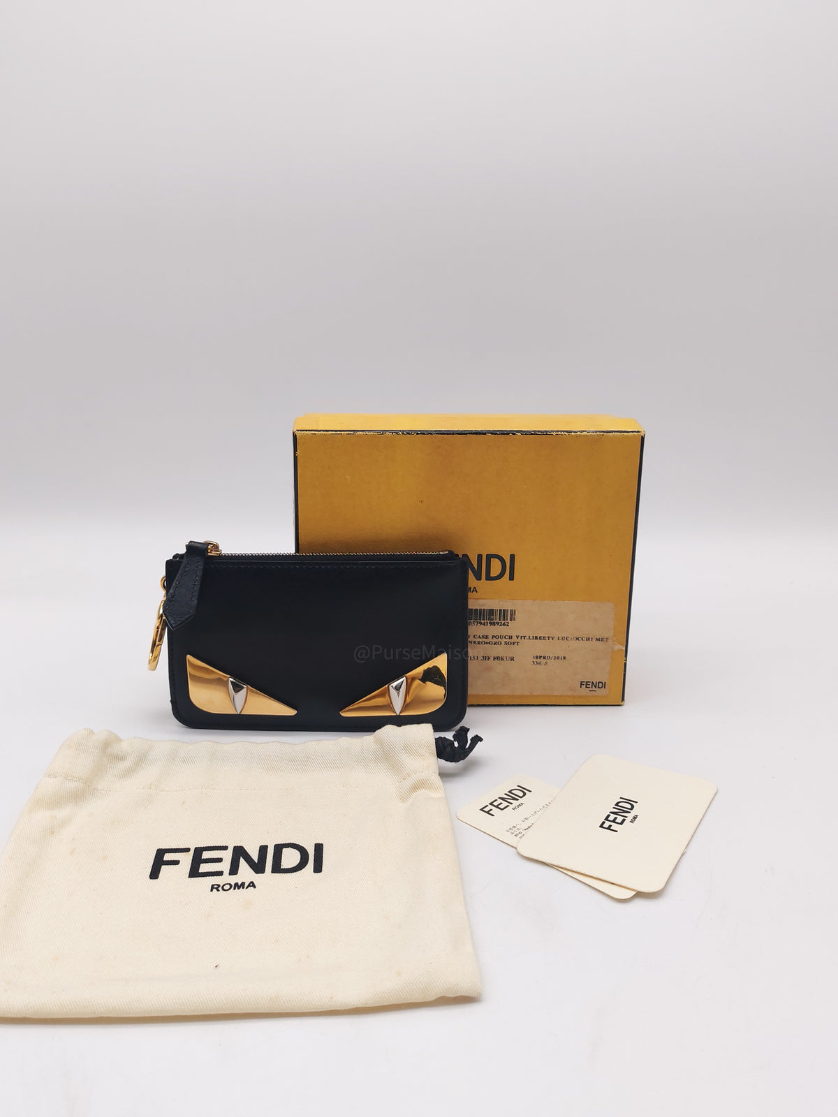 Fendi Bag Bugs Monster Eyes Key Coin Pouch in Black Calfskin Leather and Gold Hardware | Purse Maison Luxury Bags Shop
