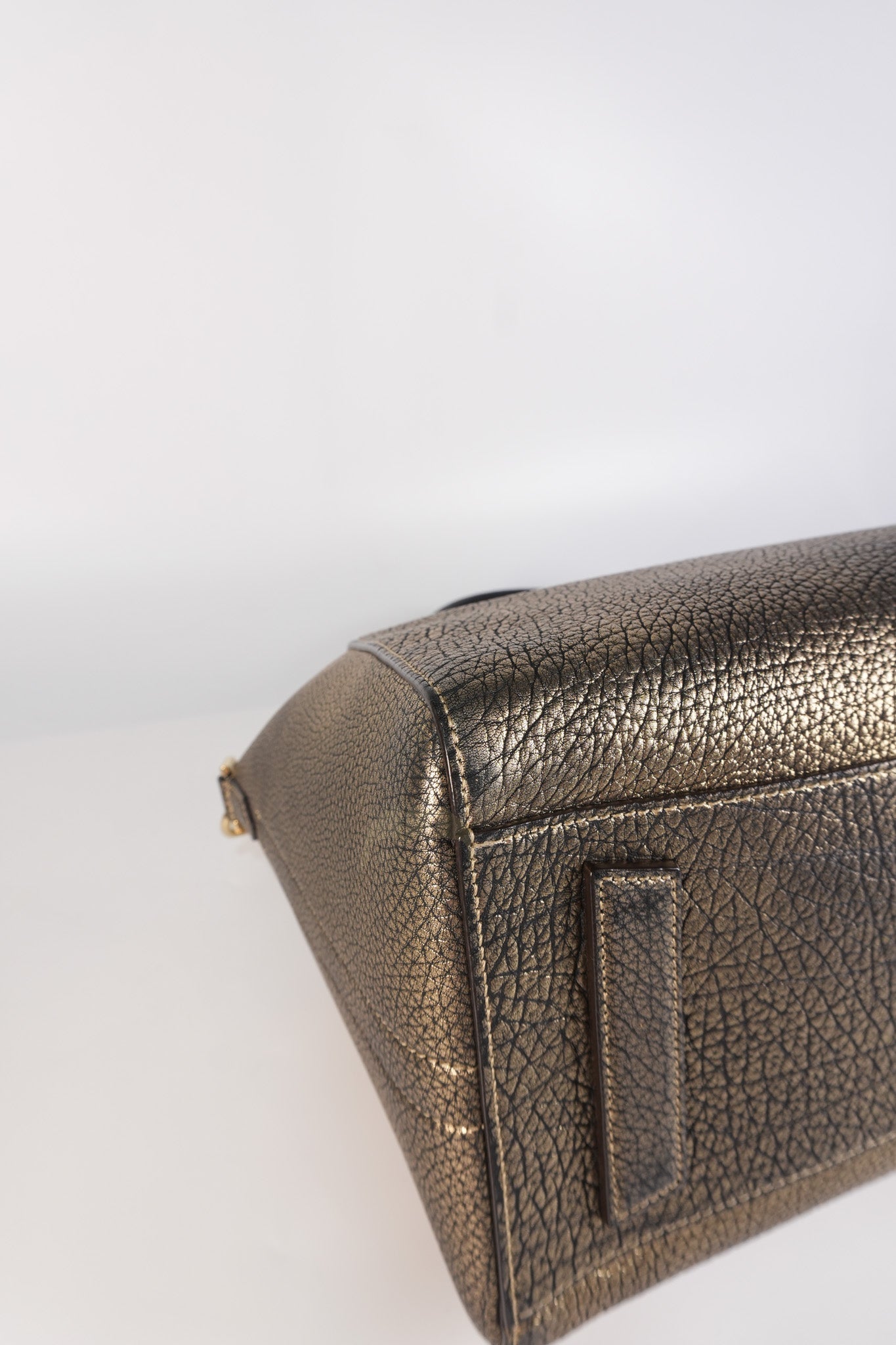 Antigona Medium in Metallic Gold Pebbled Calfskin Leather