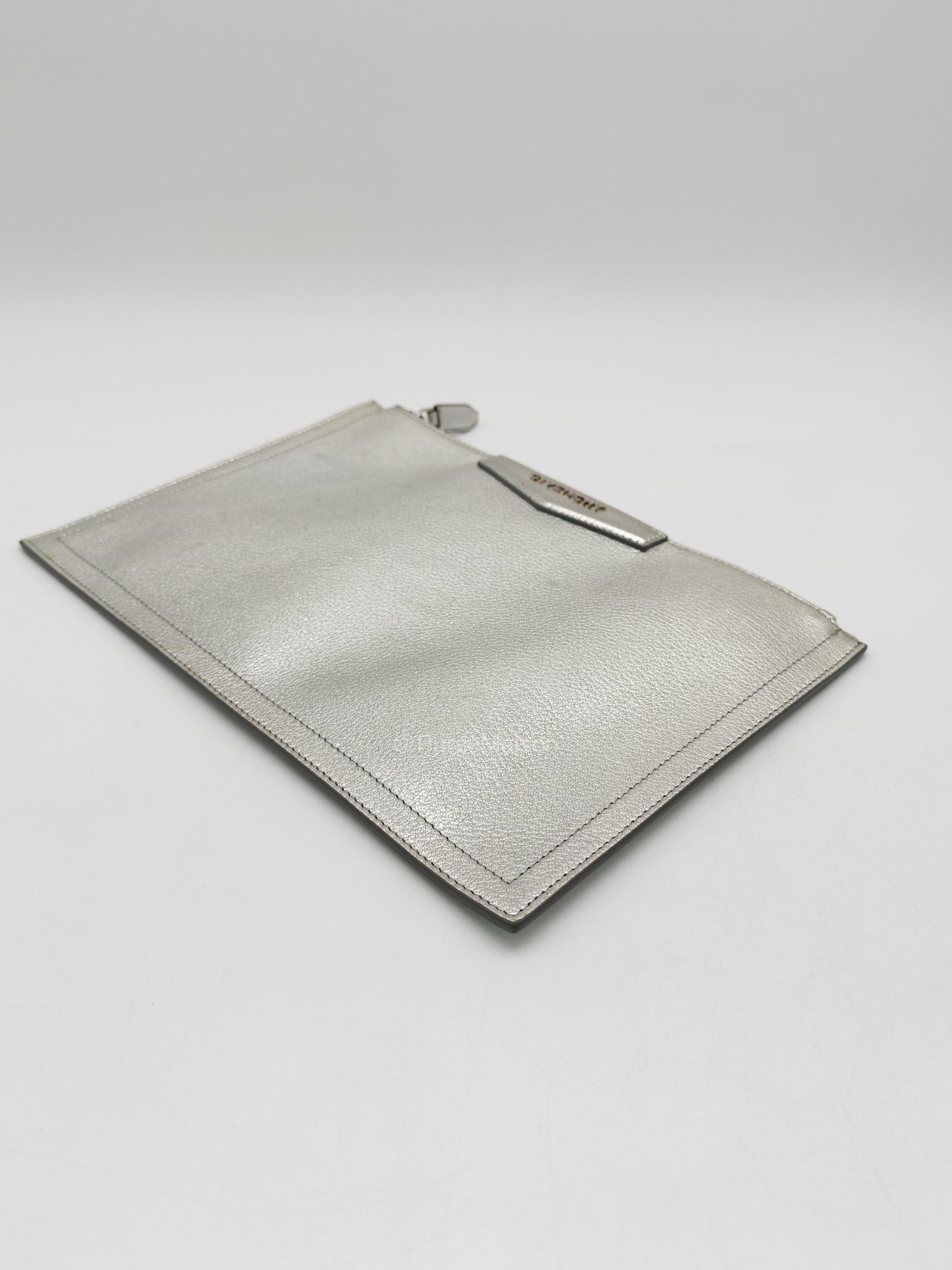 Givenchy Antigona Pouch in Metallic Silver Calf Leather and Silver Hardware | Purse Maison Luxury Bags Shop