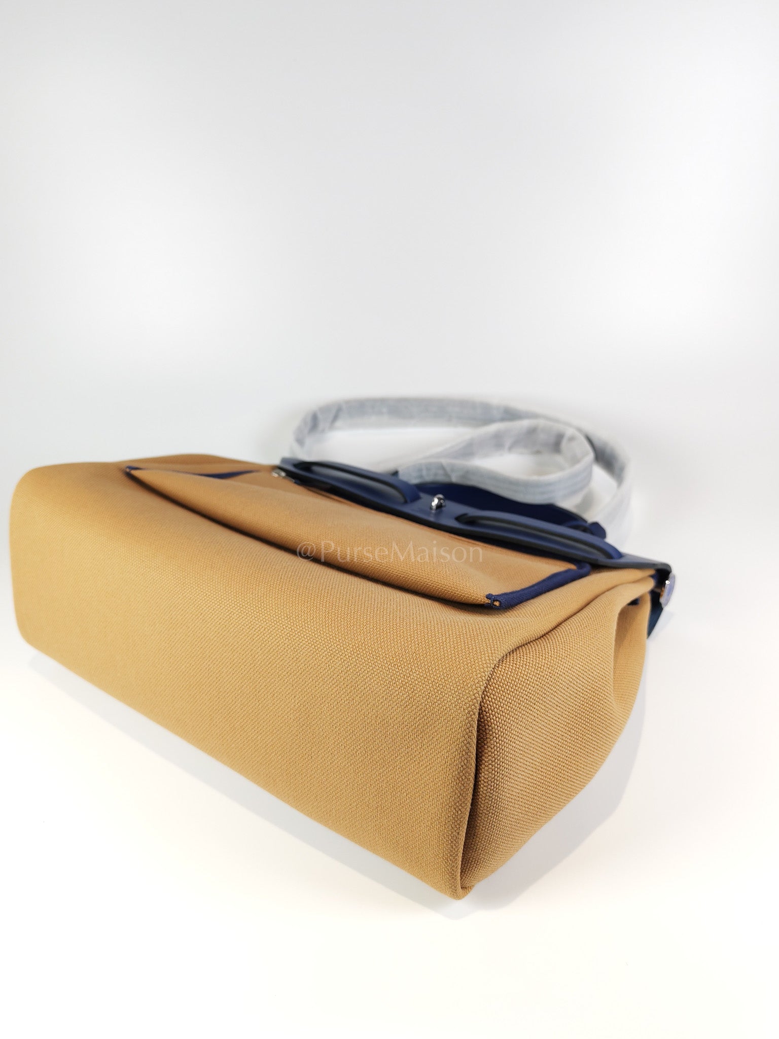 Herbag 31 Retourne in Blue Saphire Leather and Beige Canvas Stamp U (2022) | Purse Maison Luxury Bags Shop