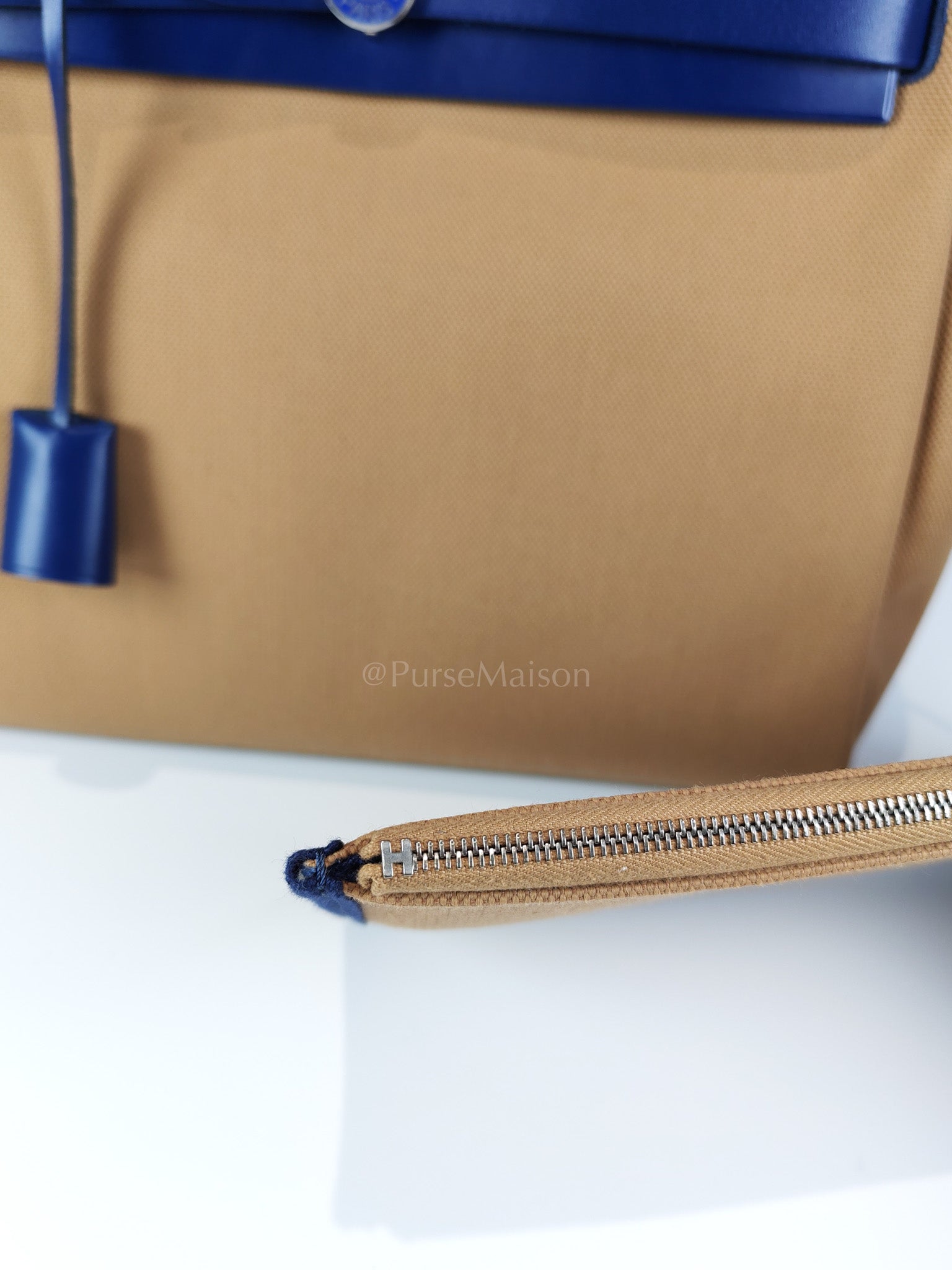 Herbag 31 Retourne in Blue Saphire Leather and Beige Canvas Stamp U (2022) | Purse Maison Luxury Bags Shop