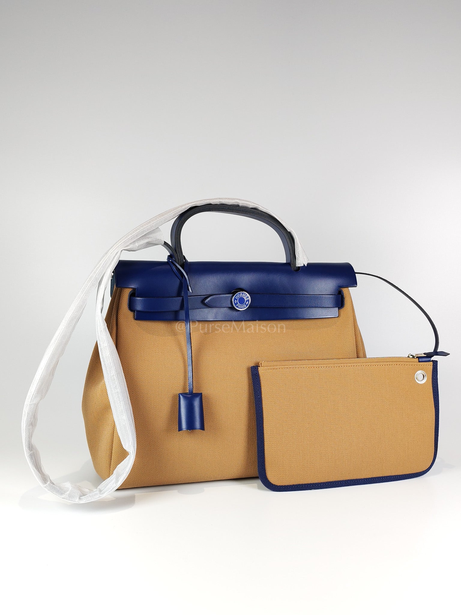 Herbag 31 Retourne in Blue Saphire Leather and Beige Canvas Stamp U (2022) | Purse Maison Luxury Bags Shop