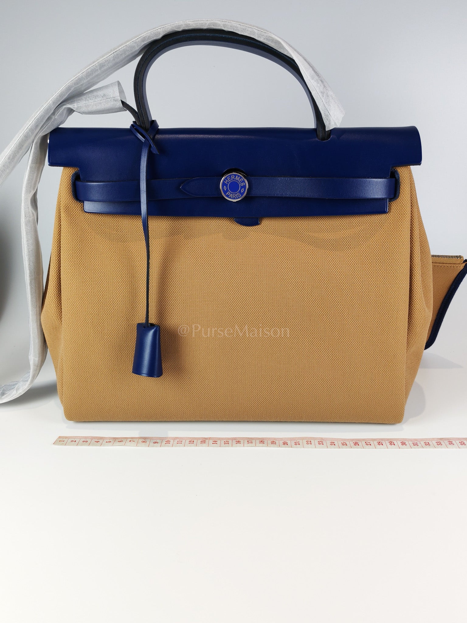 Herbag 31 Retourne in Blue Saphire Leather and Beige Canvas Stamp U (2022) | Purse Maison Luxury Bags Shop