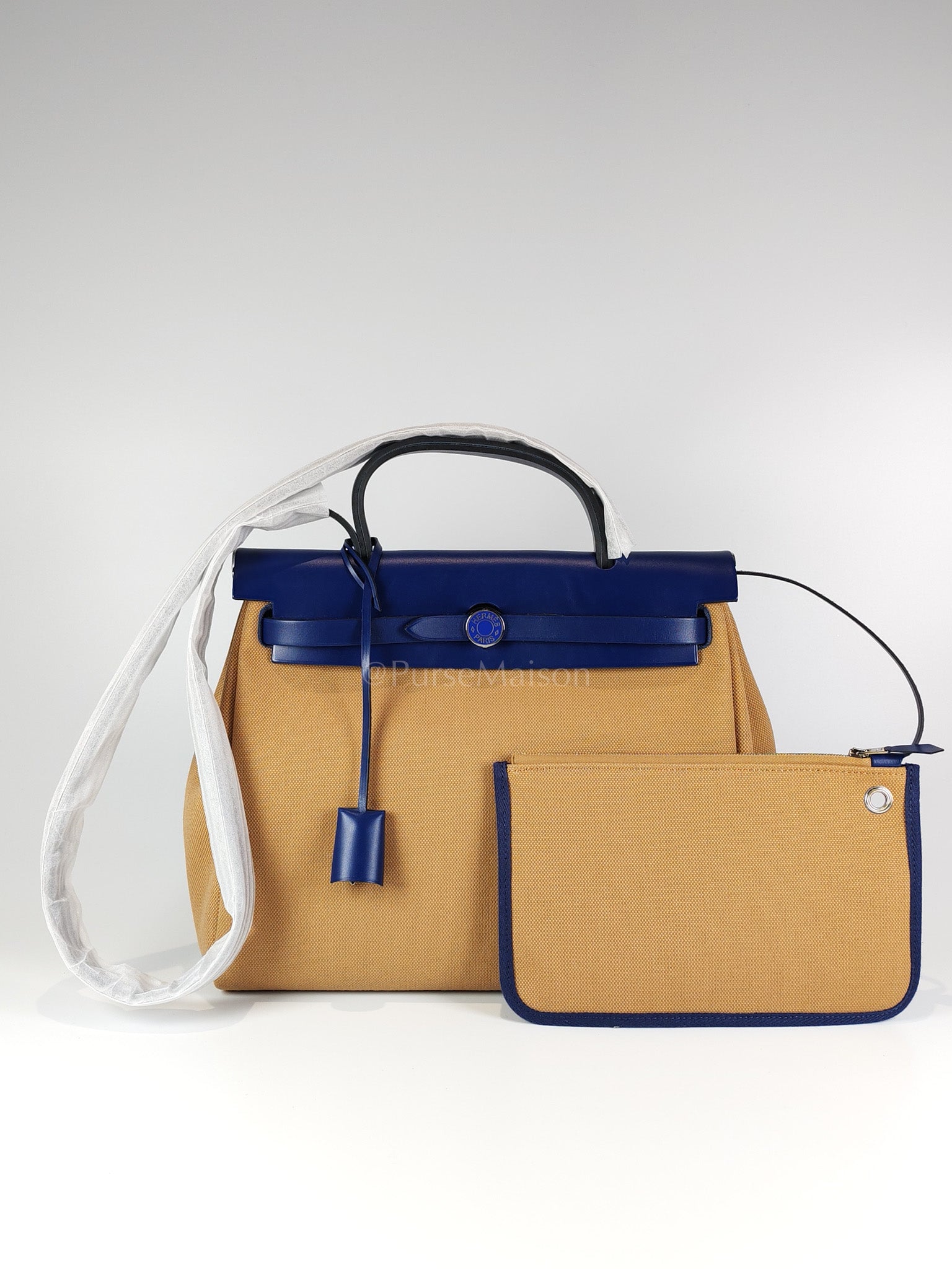 Herbag 31 Retourne in Blue Saphire Leather and Beige Canvas Stamp U (2022) | Purse Maison Luxury Bags Shop