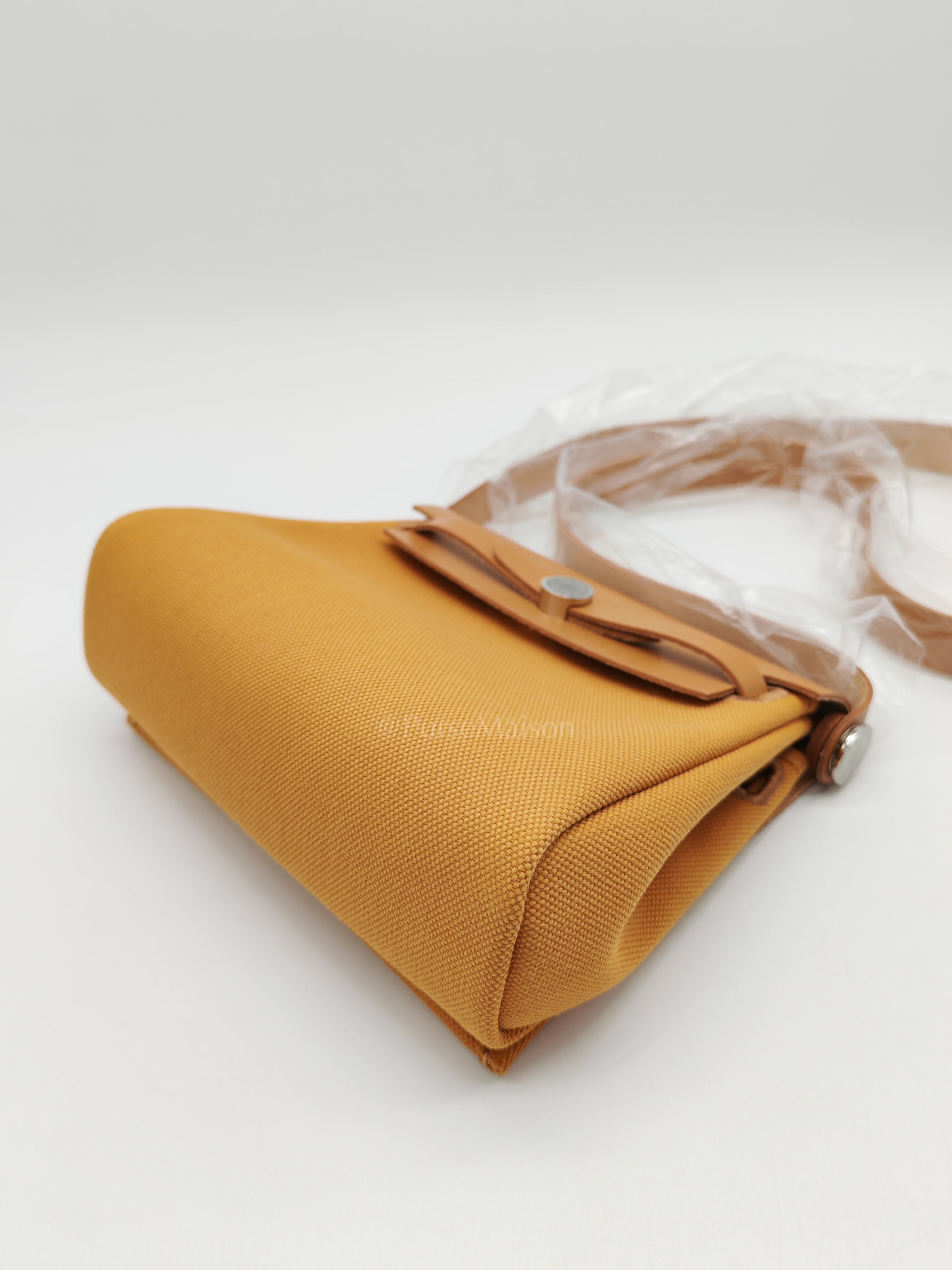 Herbag Mini in Sesame Canvas Palladium Hardware Stamp K(2025) | Purse Maison Luxury Bags Shop