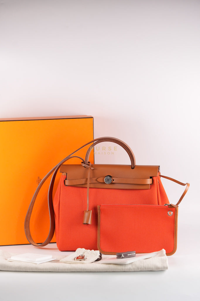 Herbag Zip 31 Capucine Toile H Berline Vache Fauve Hunter Naturel Palladium Hardware Stamp B (2023) | Purse Maison Luxury Bags Shop