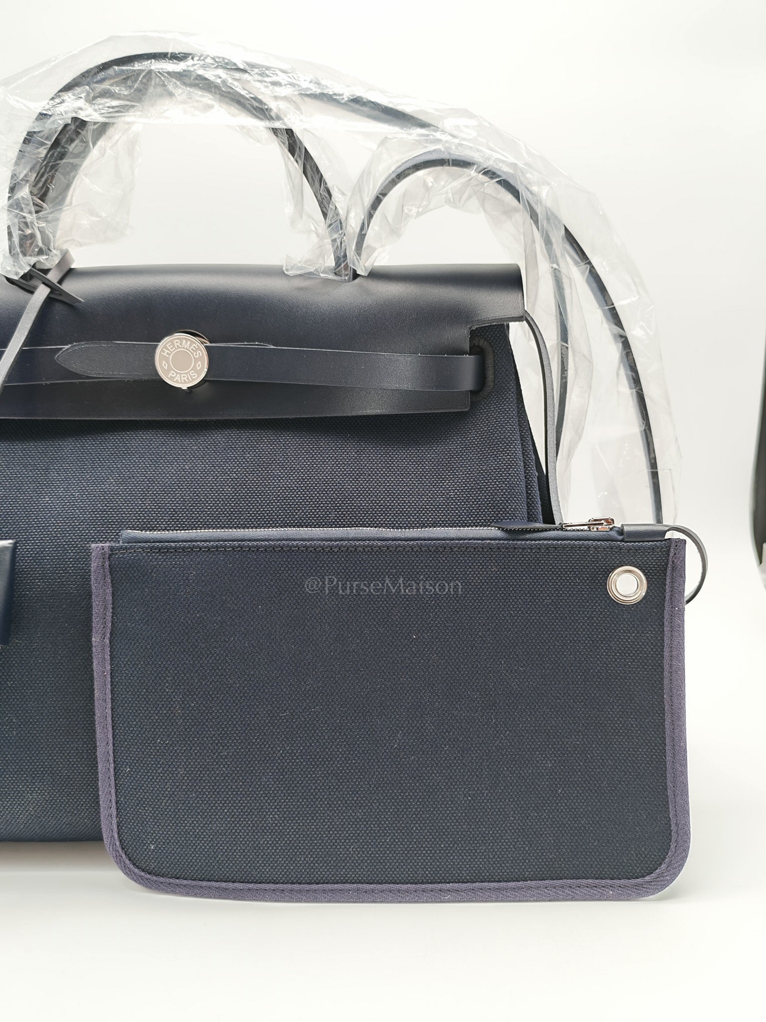 Herbag Zip 31 Toile Militaire/Vache Hunter Blue Indigo in Palladium Hardware Stamp G(2026) | Purse Maison Luxury Bags Shop