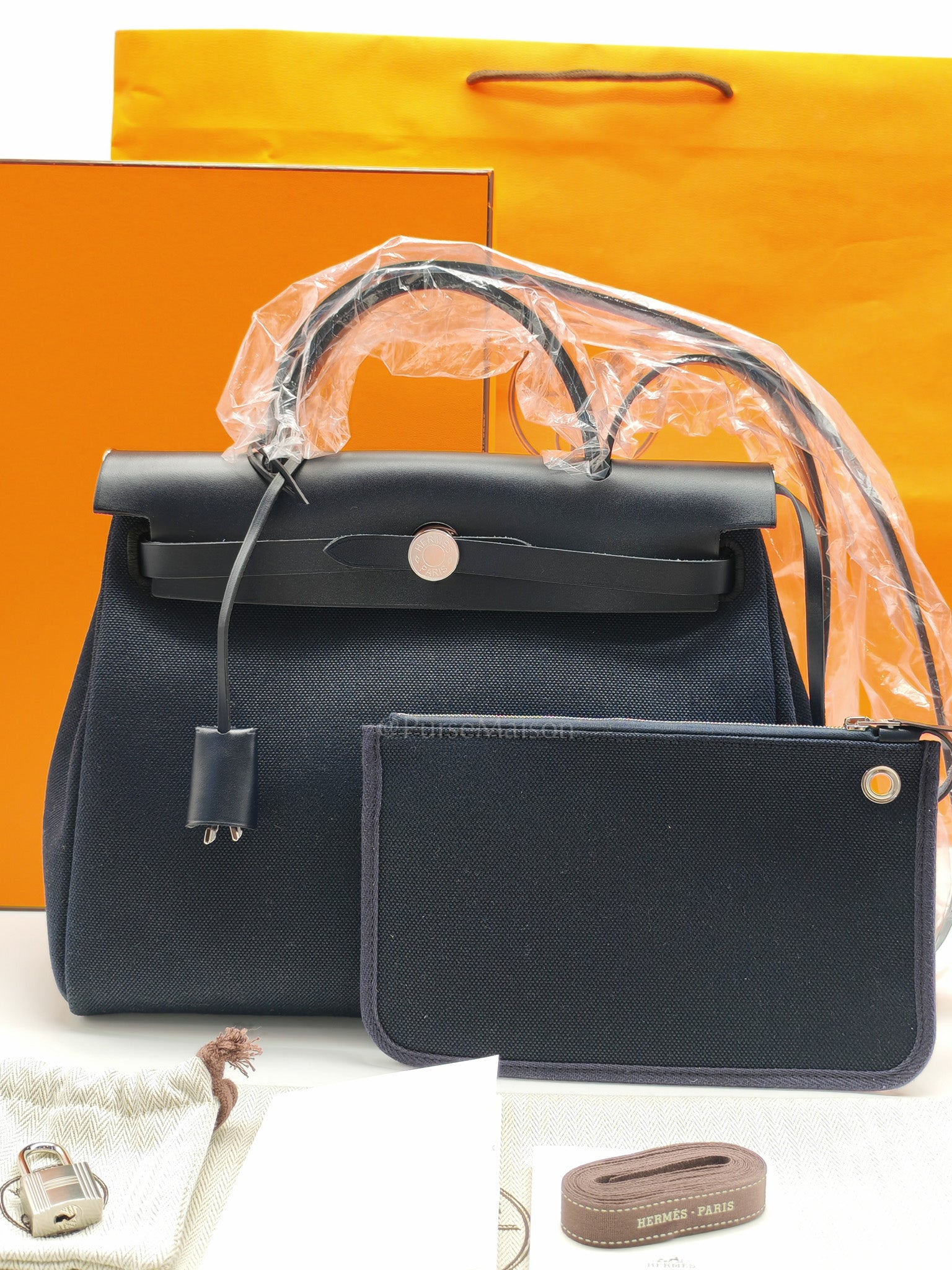 Herbag Zip 31 Toile Militaire/Vache Hunter Blue Indigo in Palladium Hardware Stamp G(2026) | Purse Maison Luxury Bags Shop