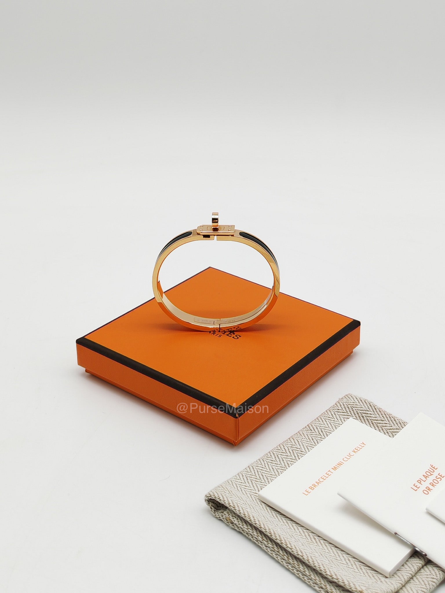 Hermes Mini Clic Kelly Bracelet PM in Black Enamel Gold Hardware | Purse Maison Luxury Bags Shop