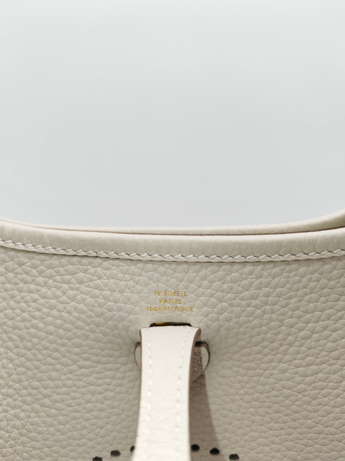 Hermes Mini Evelyne 16 TPM in Craie Clemence Leather and Gold Hardware Stamp W (2024) | Purse Maison Luxury Bags Shop