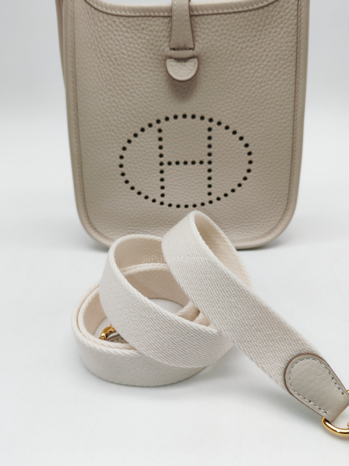 Hermes Mini Evelyne 16 TPM in Craie Clemence Leather and Gold Hardware Stamp W (2024) | Purse Maison Luxury Bags Shop
