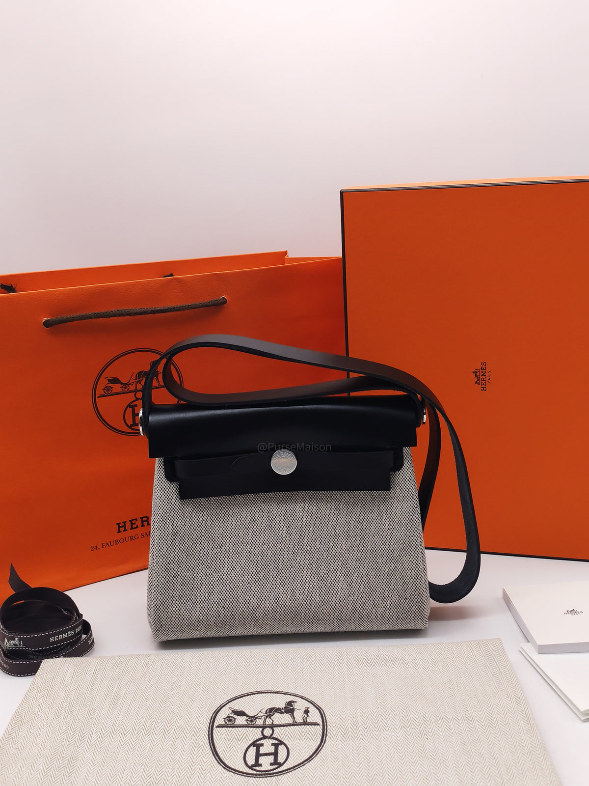 Hermes Mini Herbag Zip Retourne 20 in Ecru Black Military Toile Vache Hunter Stamp G (2026) | Purse Maison Luxury Bags Shop