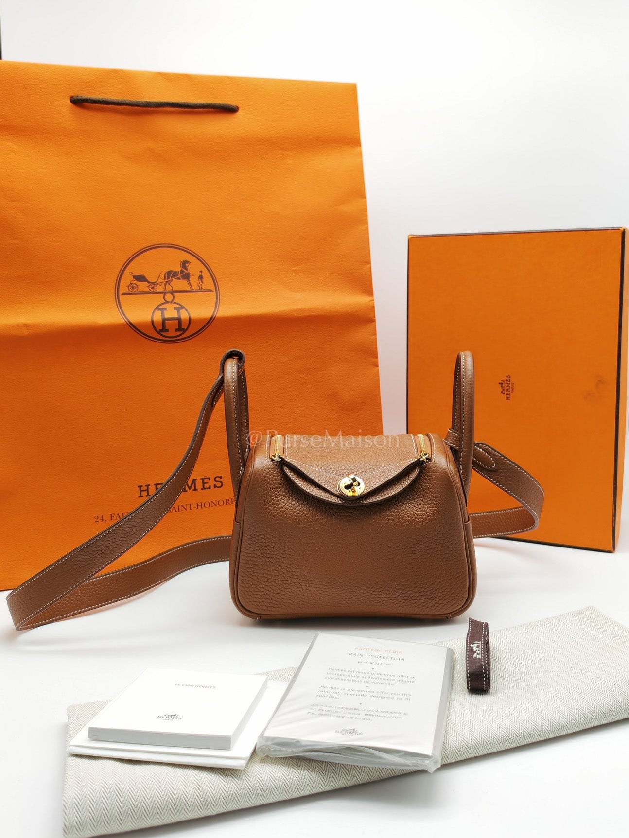 Hermes Mini Lindy Gold Clemence Leather and Gold Hardware Stamp U (2022) | Purse Maison Luxury Bags Shop
