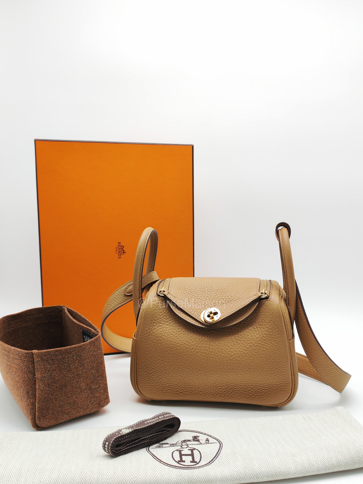 Hermes Mini Lindy in Buiscuit Clemence Leather Gold Hardware Stamp U(2022) | Purse Maison Luxury Bags Shop