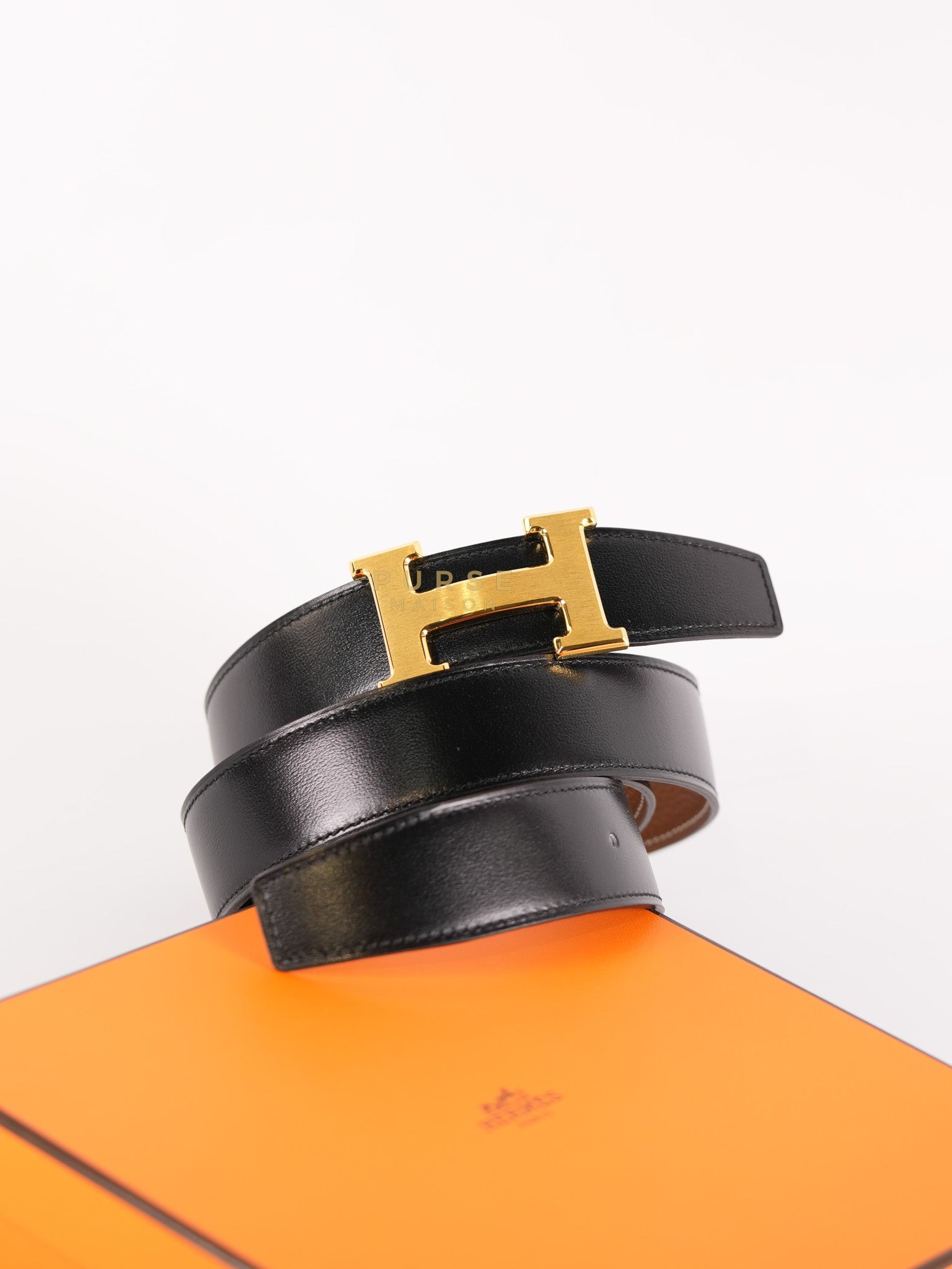 Constance H Reversible Belt in Black/Gold Stamp U Size 100